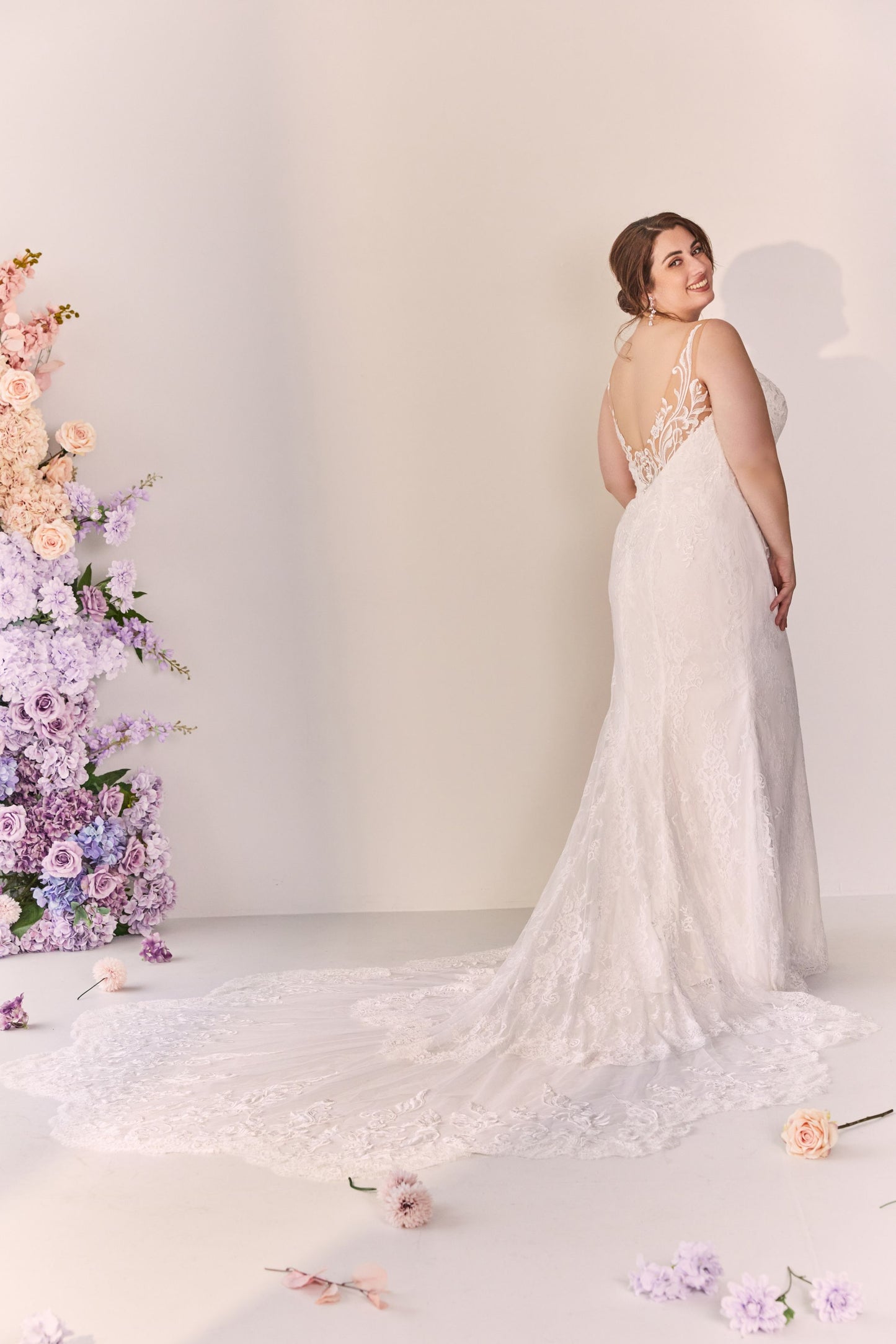 Lace V-neck sheath wedding dress.