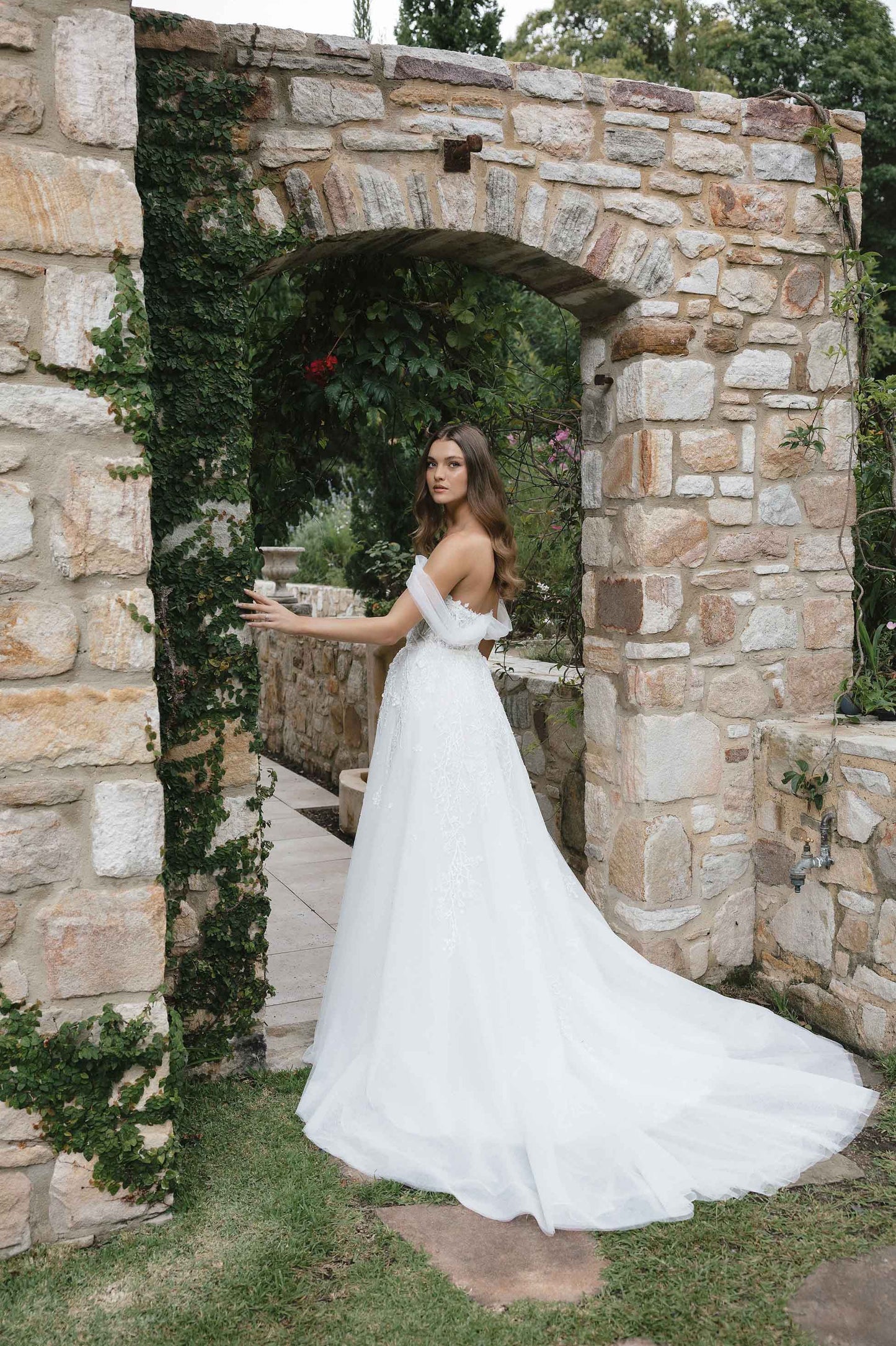 Lauren Gown – A-line bridal dress with off-shoulder straps amd corseted bodice by Roselle Collection Jessica Couture