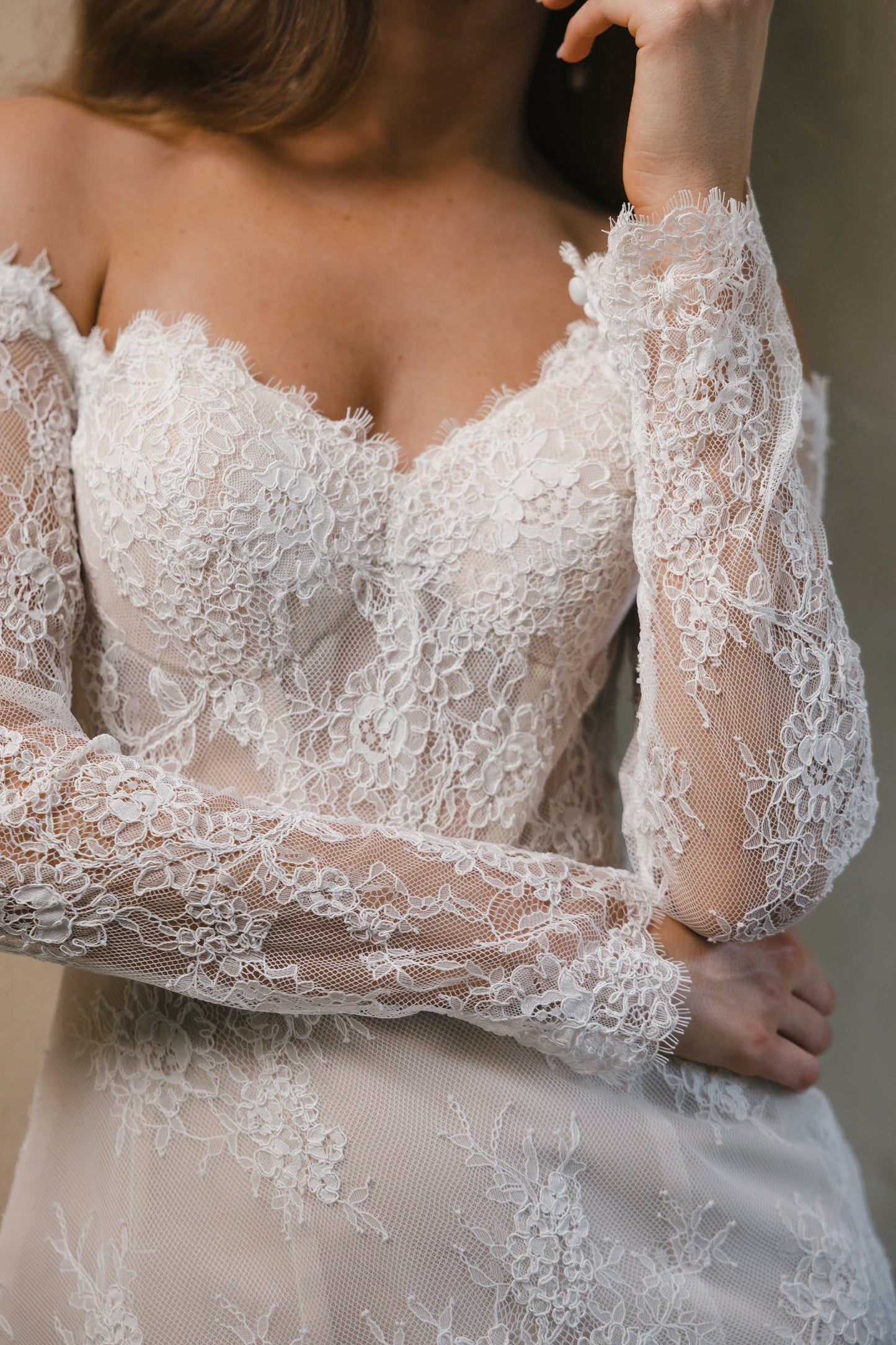 Bridal gown Lillian is a vintage-inspired mini with delicate lace, perfect for champagne celebrations late into the night. By Roselle Collection Jessica Couture.