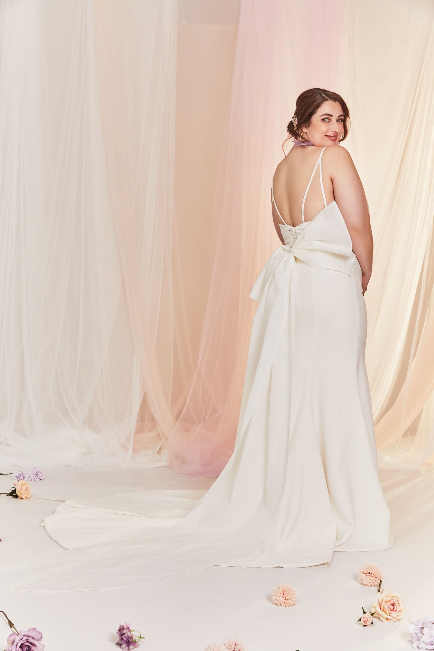 Fit and flare style with V-neck and spaghetti straps.