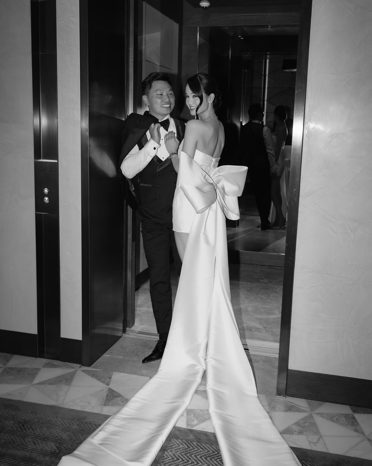 Fitted, strapless mini bridal dress in Mikado fabric