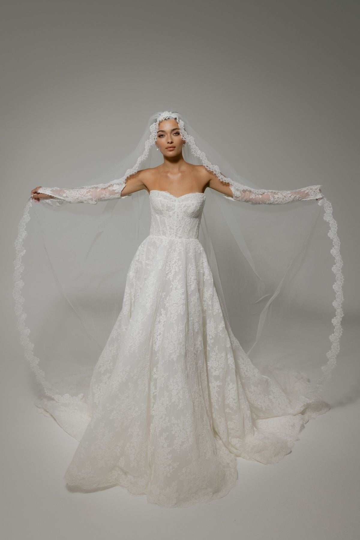 Bride wears The Gabriella Veil, which s perfect lace ensemble for vintage wedding