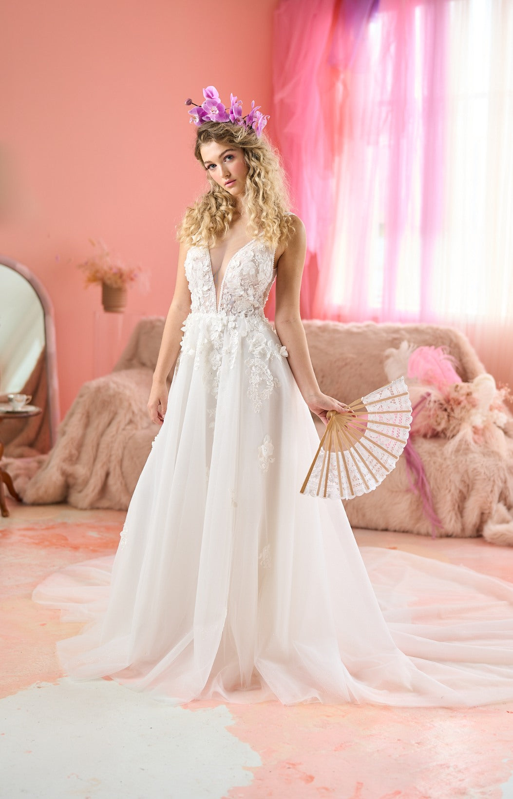 Model wearing A-line Sookie wedding dress with 3D florals from the Mademoiselle collection