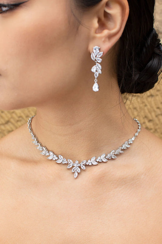 Short length diamante necklace on silver backing in organic navette shape.