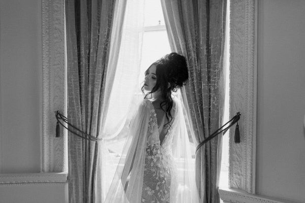 Model wearing Saige floral lace wedding dress