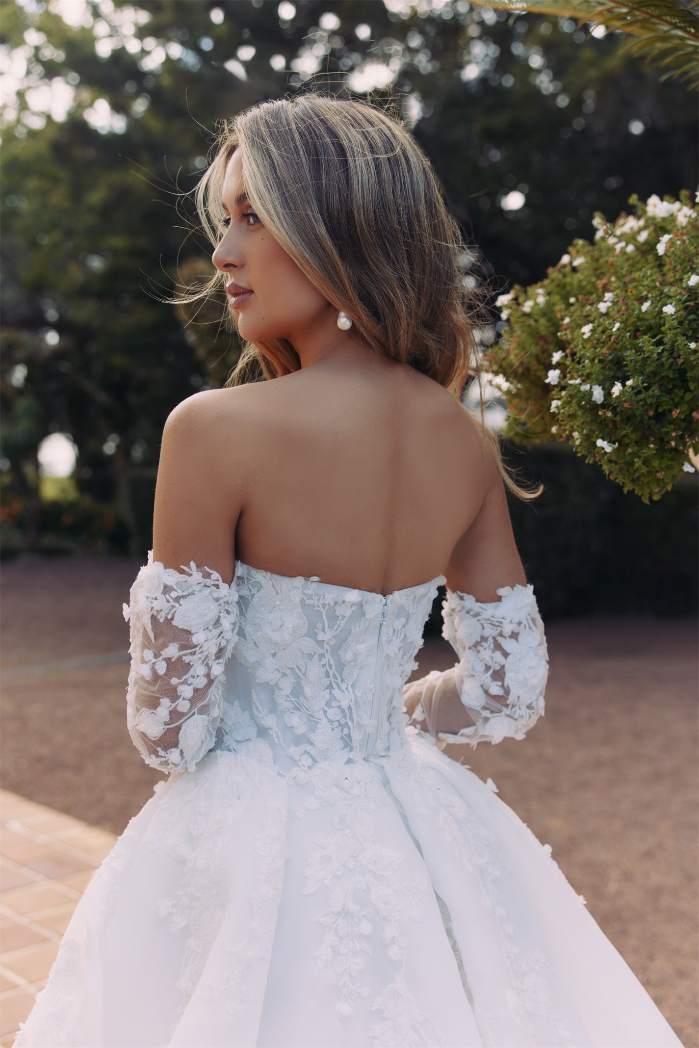 ARTEMIS Bridal gown - By Victoria Collection Jessica Couture, featuring an A-line Princess Ballgown covered in delicate leaf lace, Basque Waist and chapel train. 