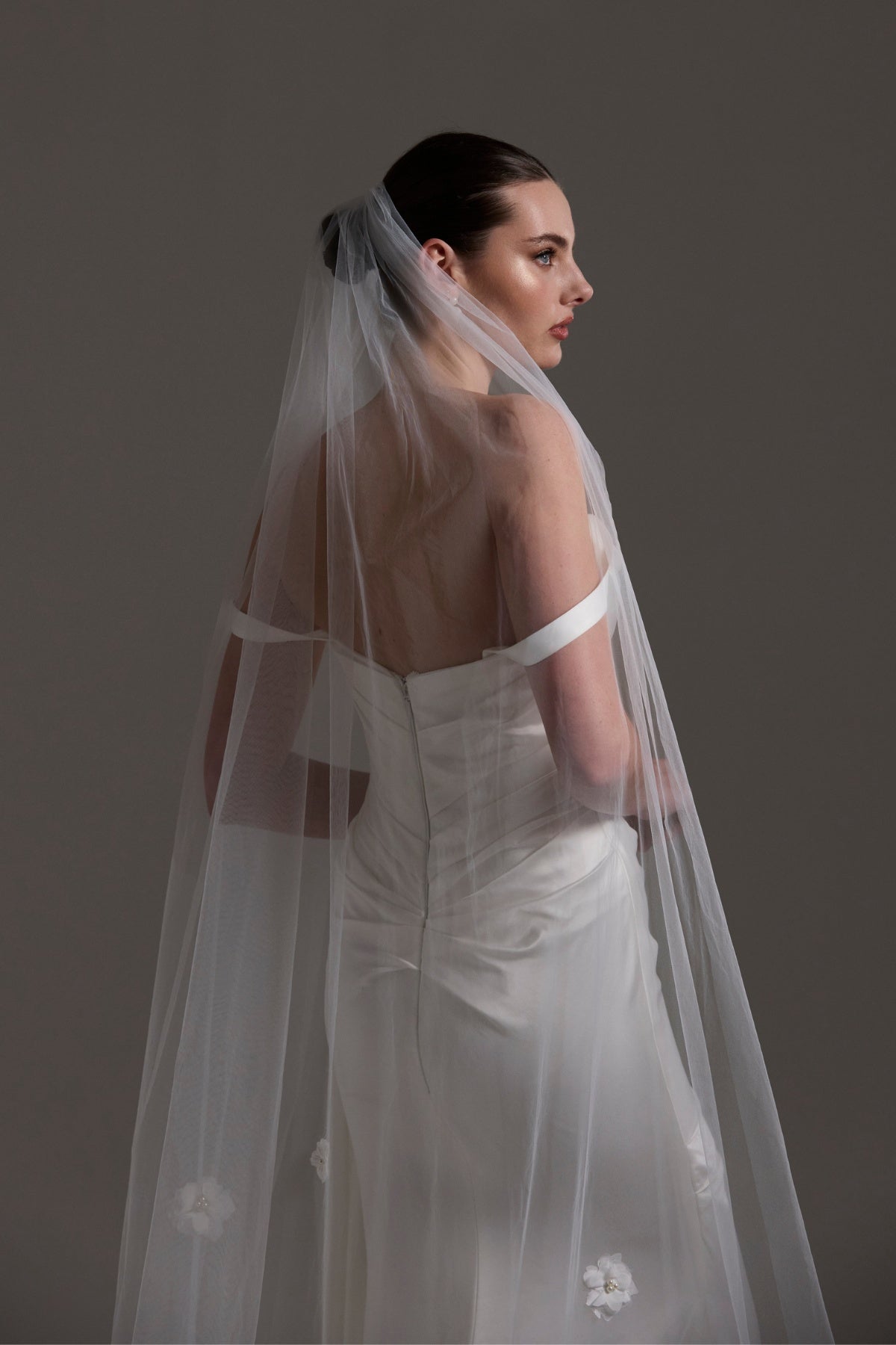 Tulle bridal Veil with 3D flowers trailing behind 