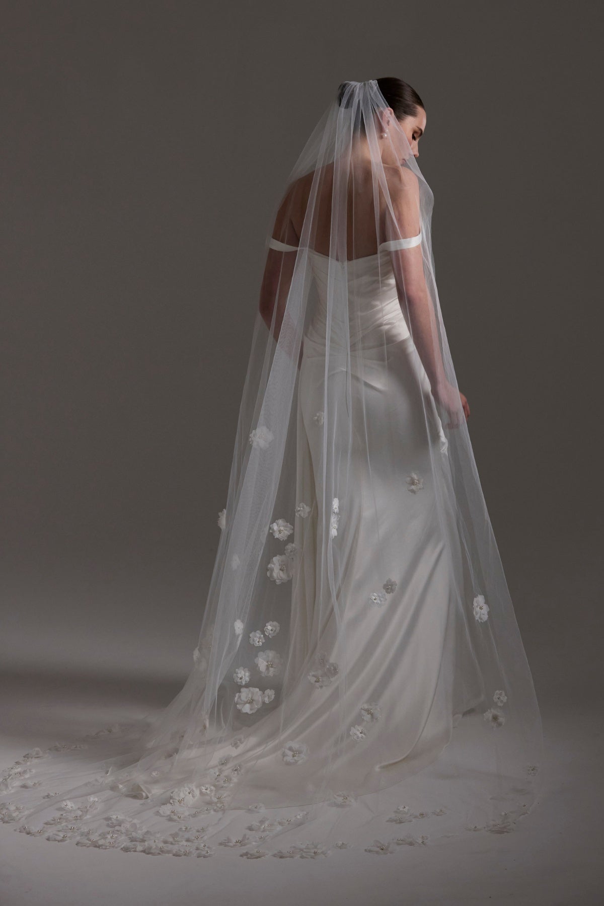 Tulle bridal Veil with 3D flowers trailing behind 