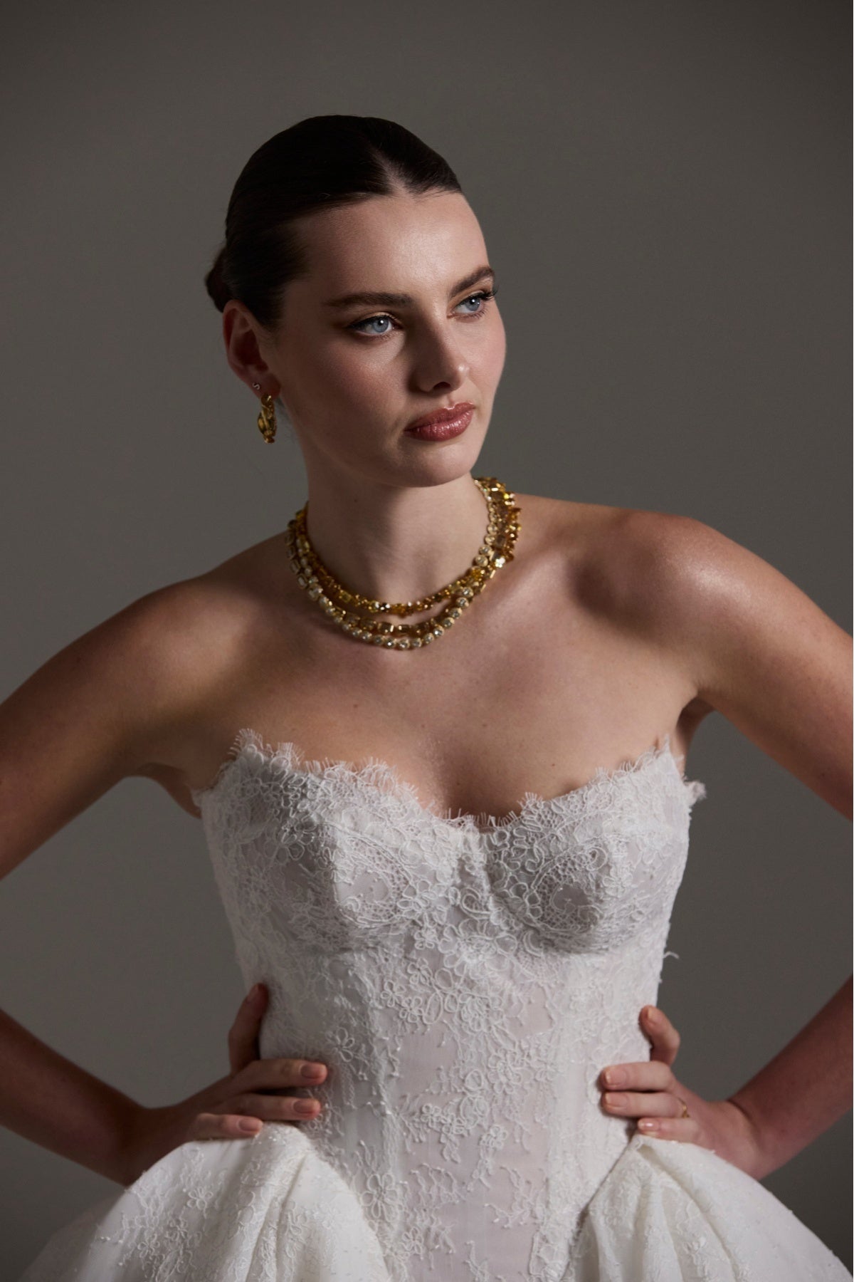 A line ballgown wedding dress with sweetheart neckline,  and deep basque waistline in chantilly lace 