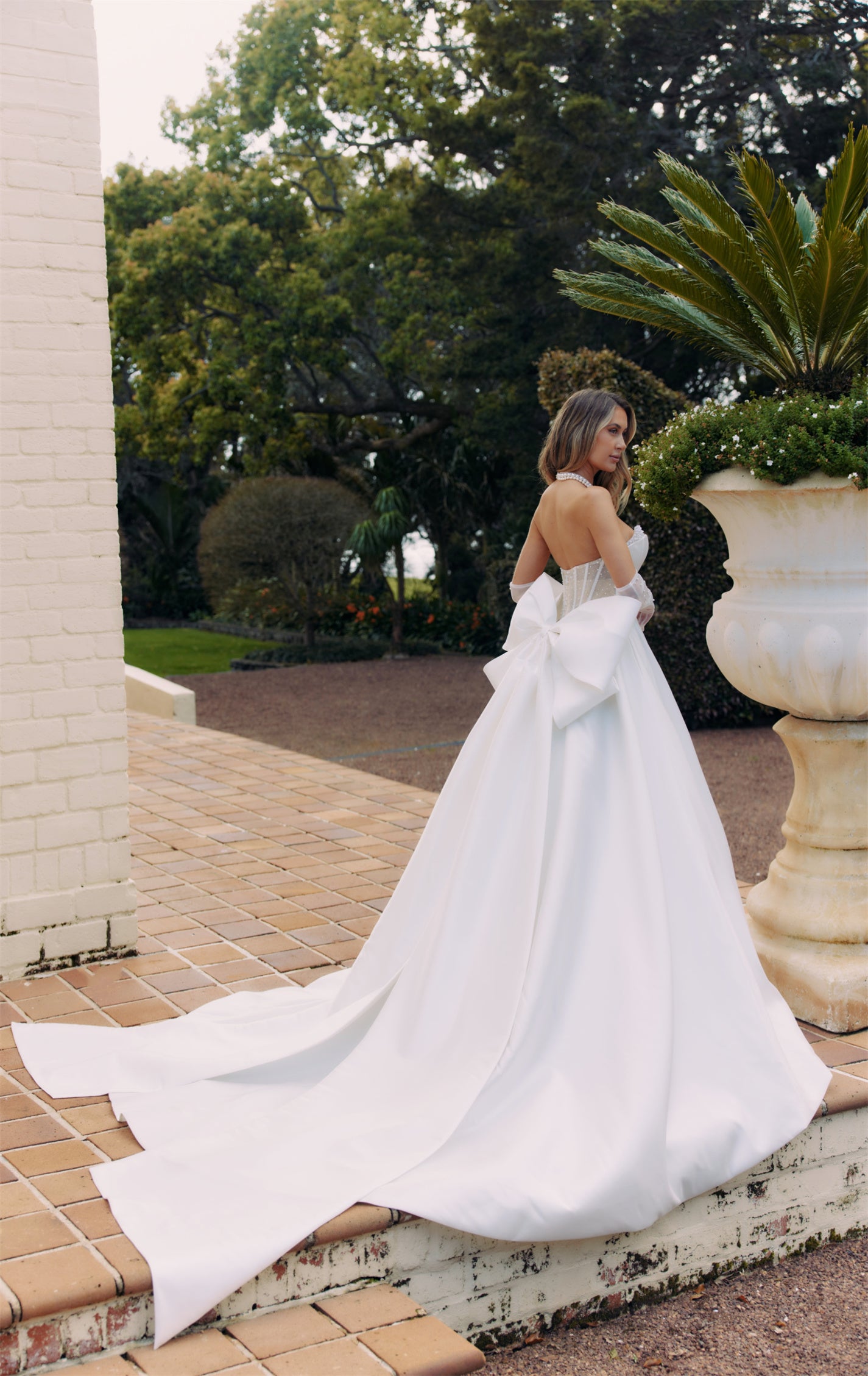 YVONNE Bridal Gown - Wedding dress by Victoria Collection Jessica Couture. Featuring an A-line Mikado gown with chapel train, and pearl encrusted cups in a Corseted bodice. 
