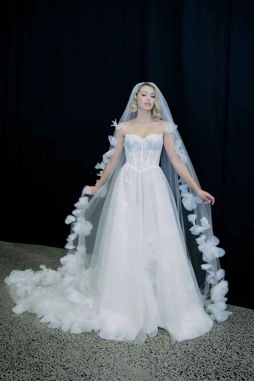 FAYE Bridal gown - By Victoria Collection Jessica Couture, featuring an A-line gown with Cat-eye bodice covered in delicate lace