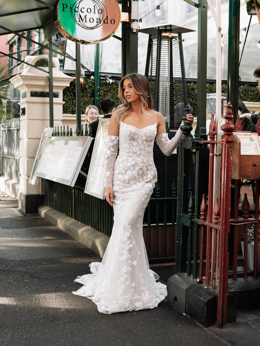 BROOKE Bridal gown - By Victoria Collection Jessica Couture, featuring an Fit-N-Flare gown covered in delicate leaf lace, low scoop back and chapel train.