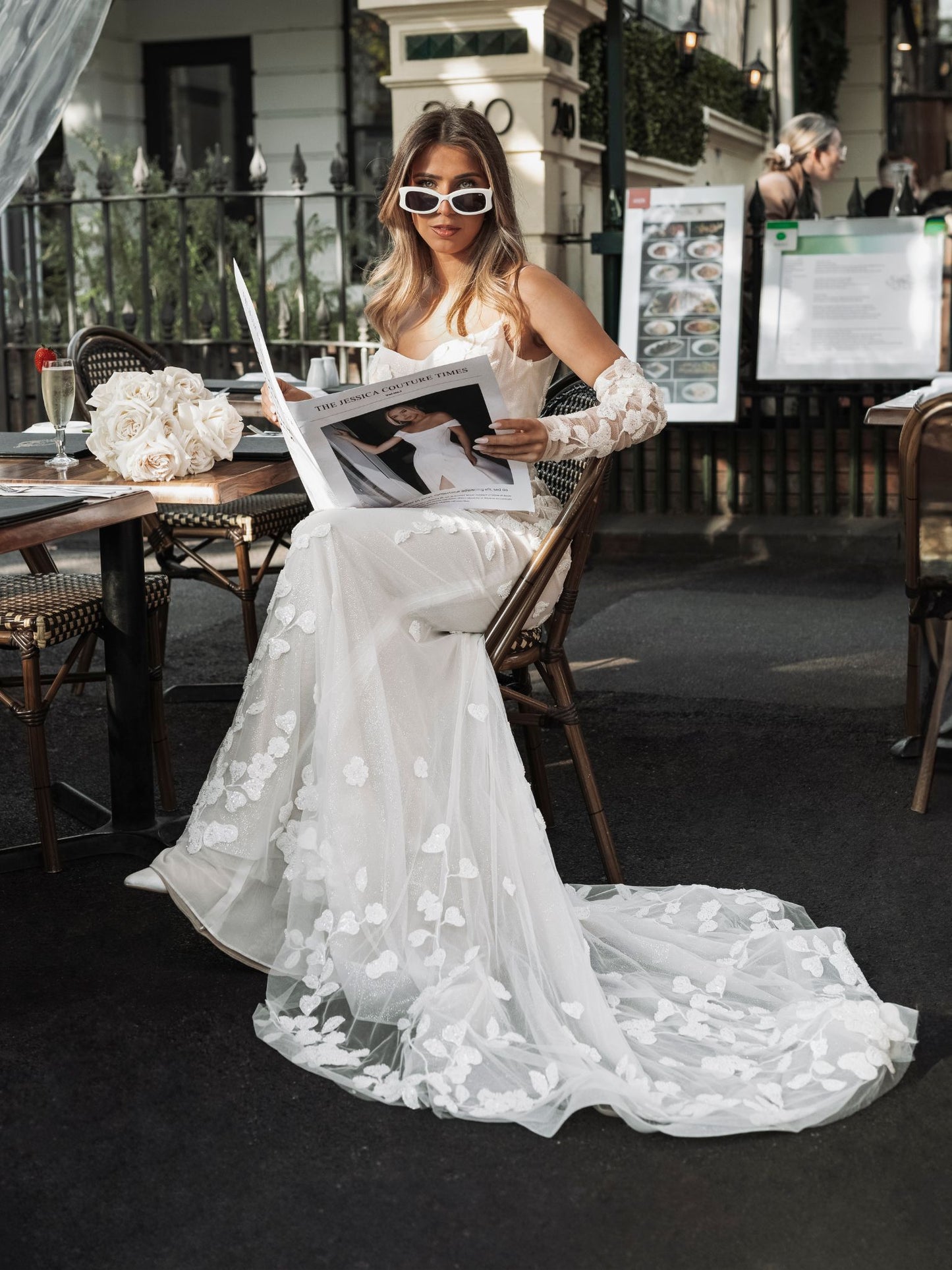 BROOKE Bridal gown - By Victoria Collection Jessica Couture, featuring an Fit-N-Flare gown covered in delicate leaf lace, low scoop back and chapel train.