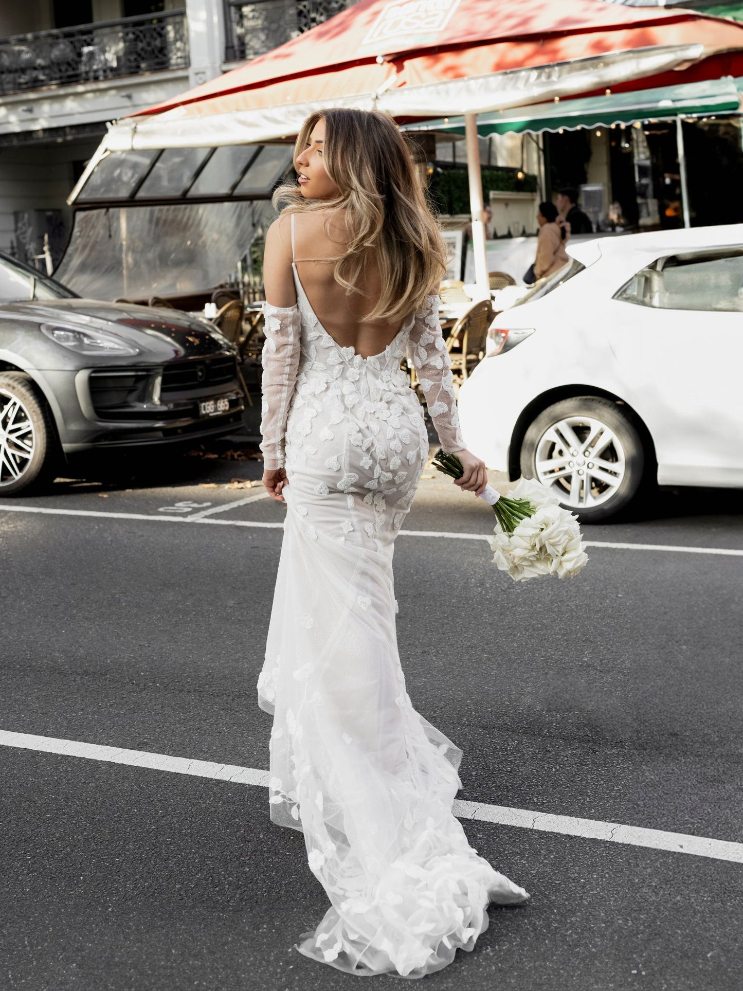 BROOKE Bridal gown - By Victoria Collection Jessica Couture, featuring an Fit-N-Flare gown covered in delicate leaf lace, low scoop back and chapel train.
