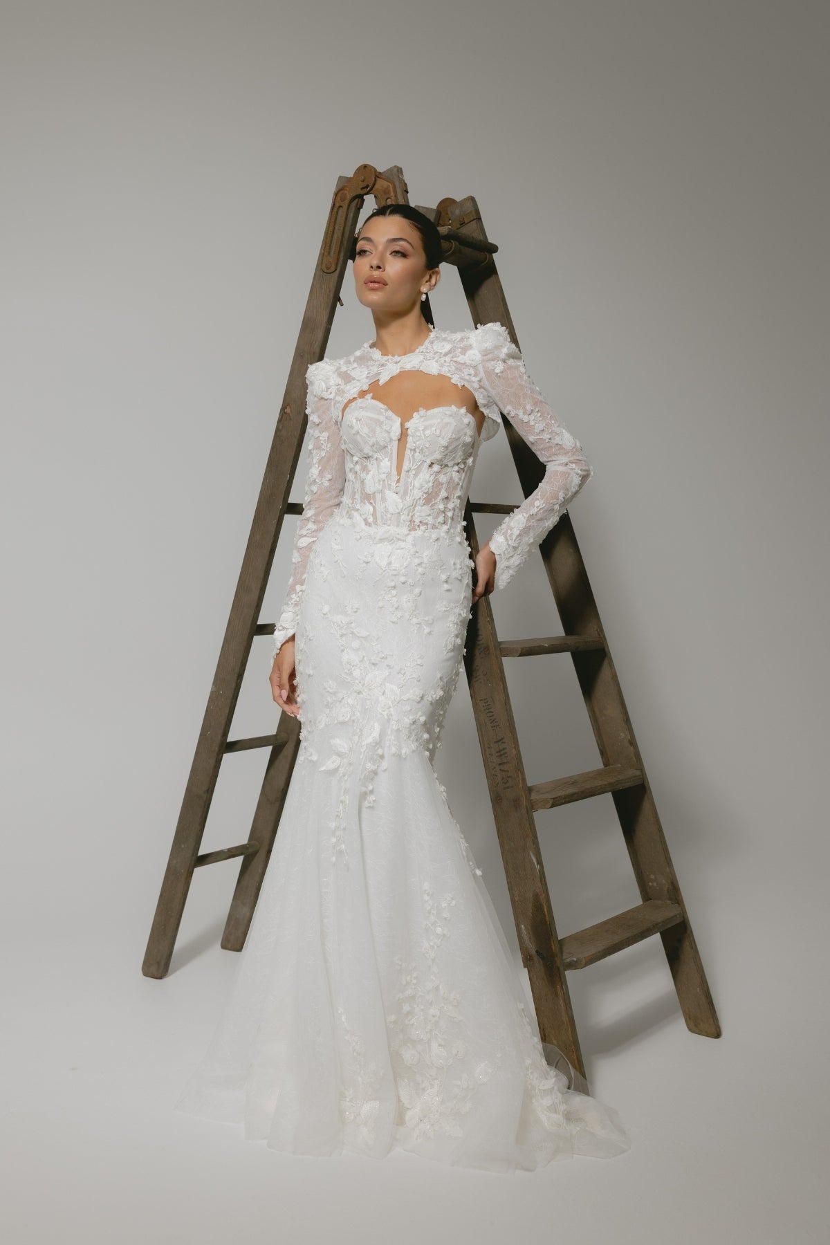 lace mermaid wedding gown, strapless sweetheart bodice with lace bolero jacket on top. 