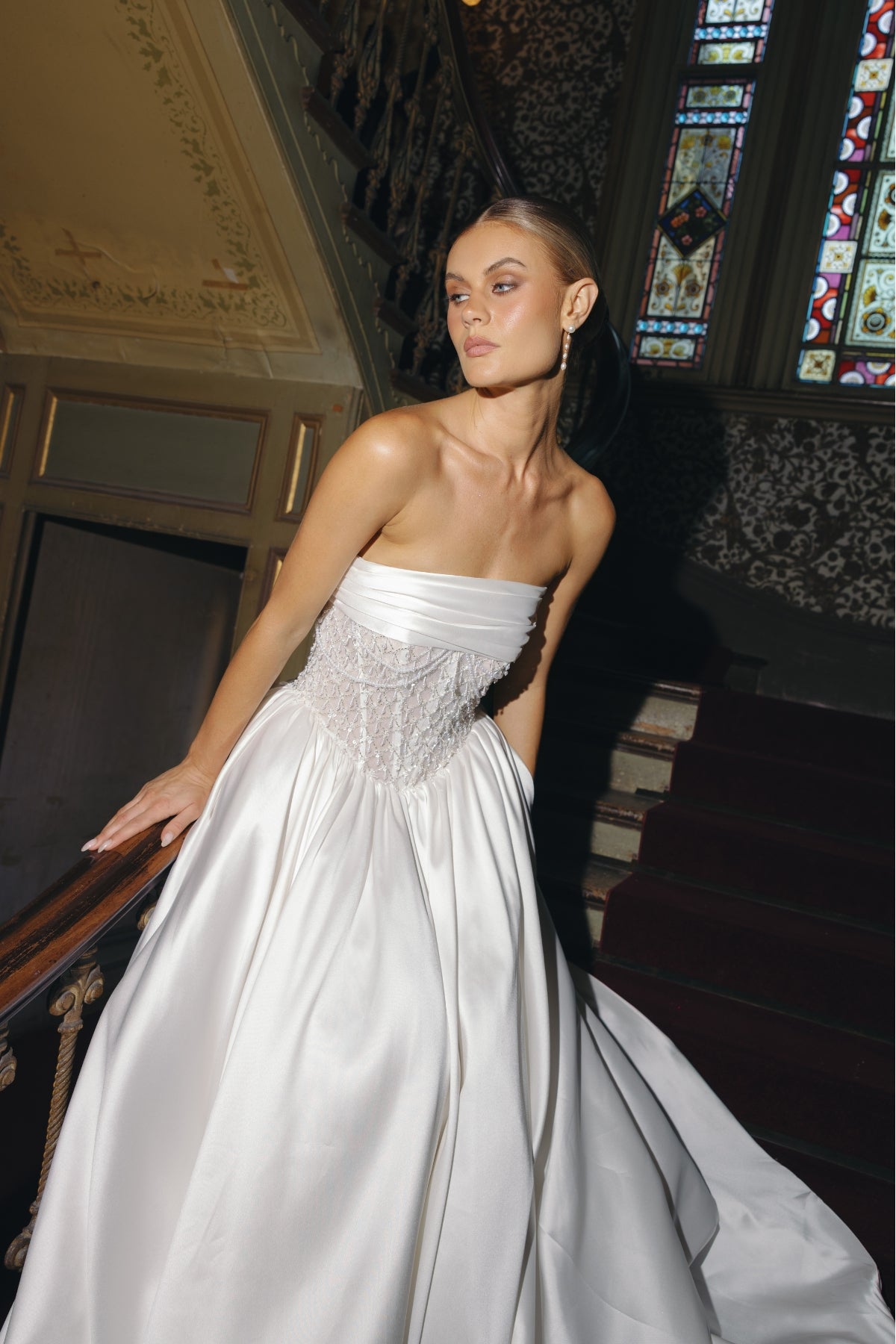 strapless A-line wedding gown with beaded pearl and crystal bodice, mikado fabric. 