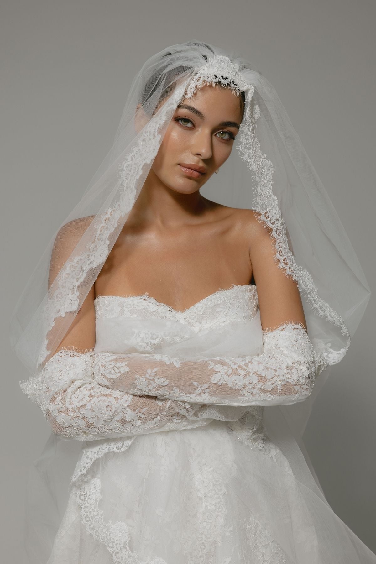 Bride wears The Gabriella Veil, which s perfect lace ensemble for vintage wedding 