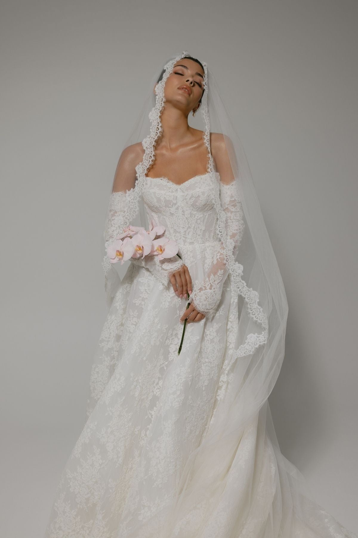 Bride wears The Gabriella Veil, which s perfect lace ensemble for vintage wedding 