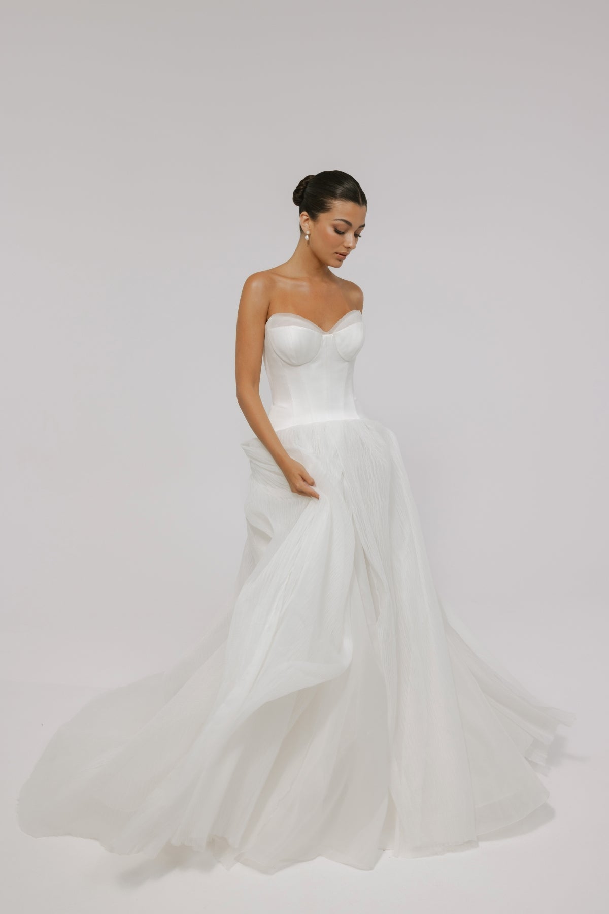 A-line wedding gown with double cups feature, modern, minimal and flowy. 