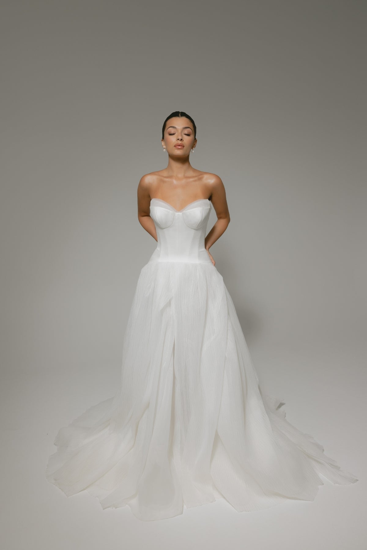 A-line wedding gown with double cups feature, modern, minimal and flowy. 