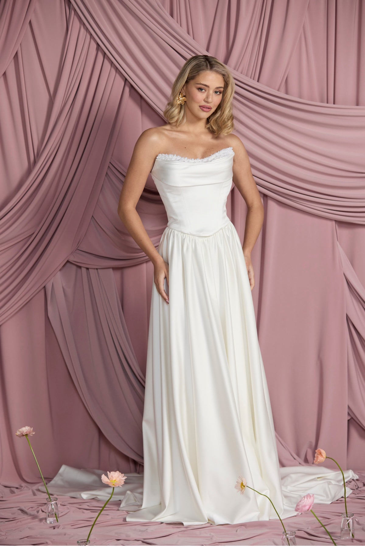 
Pearl encrusted Satin Bridal corset, with bust ruching and slight basque waist. 