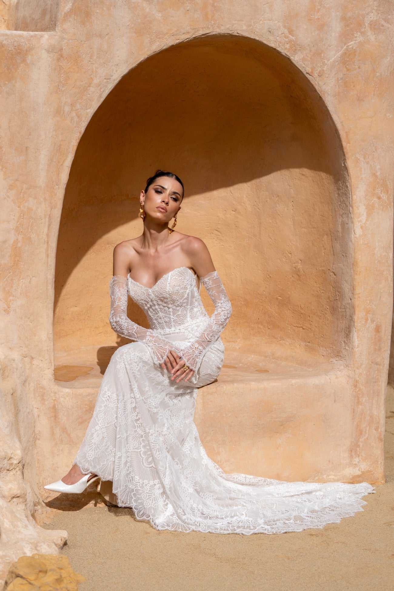 fitted lace wedding gown, with detachable fitted sleeves. 