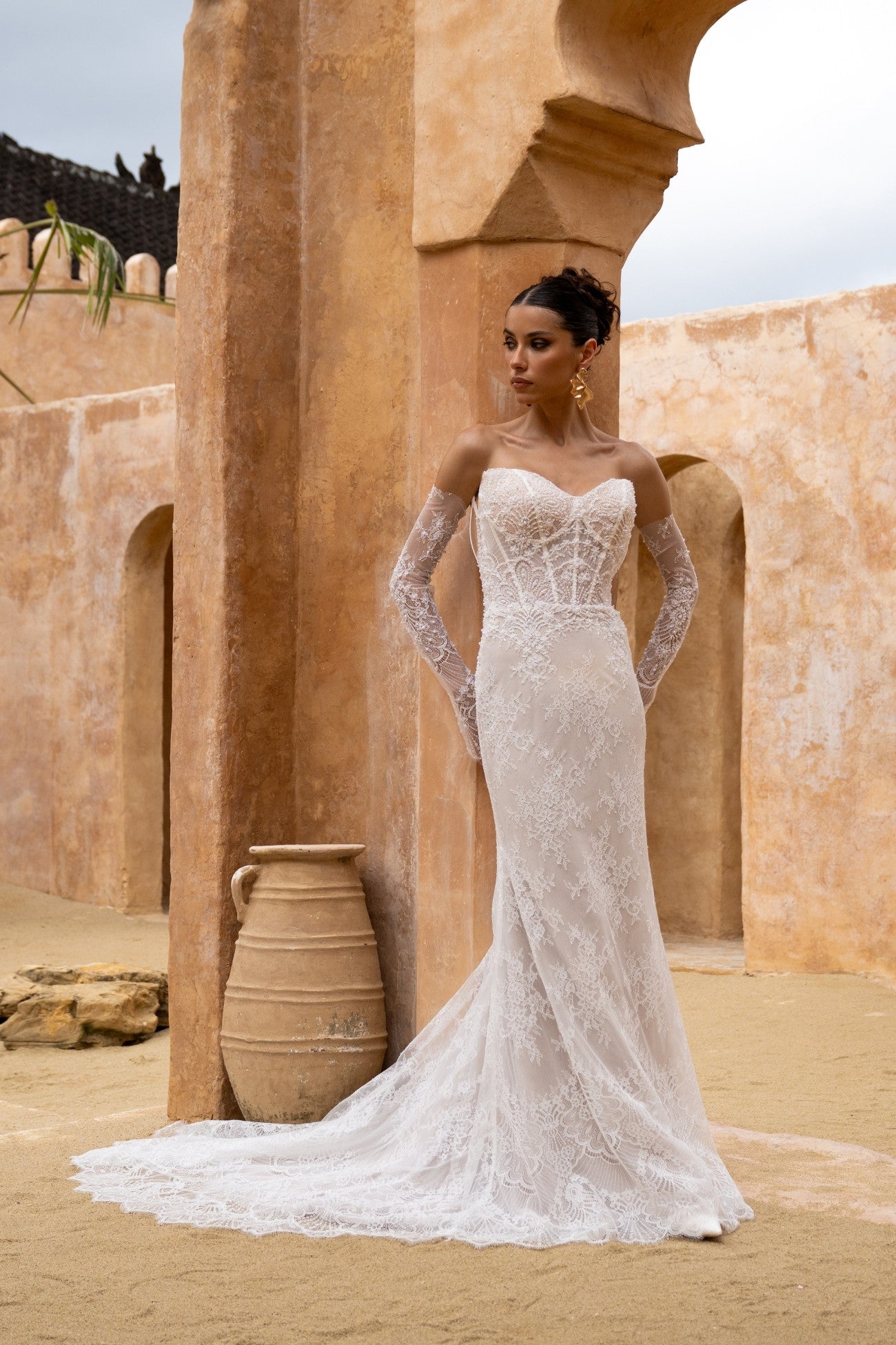 fitted lace wedding gown, with detachable fitted sleeves. 