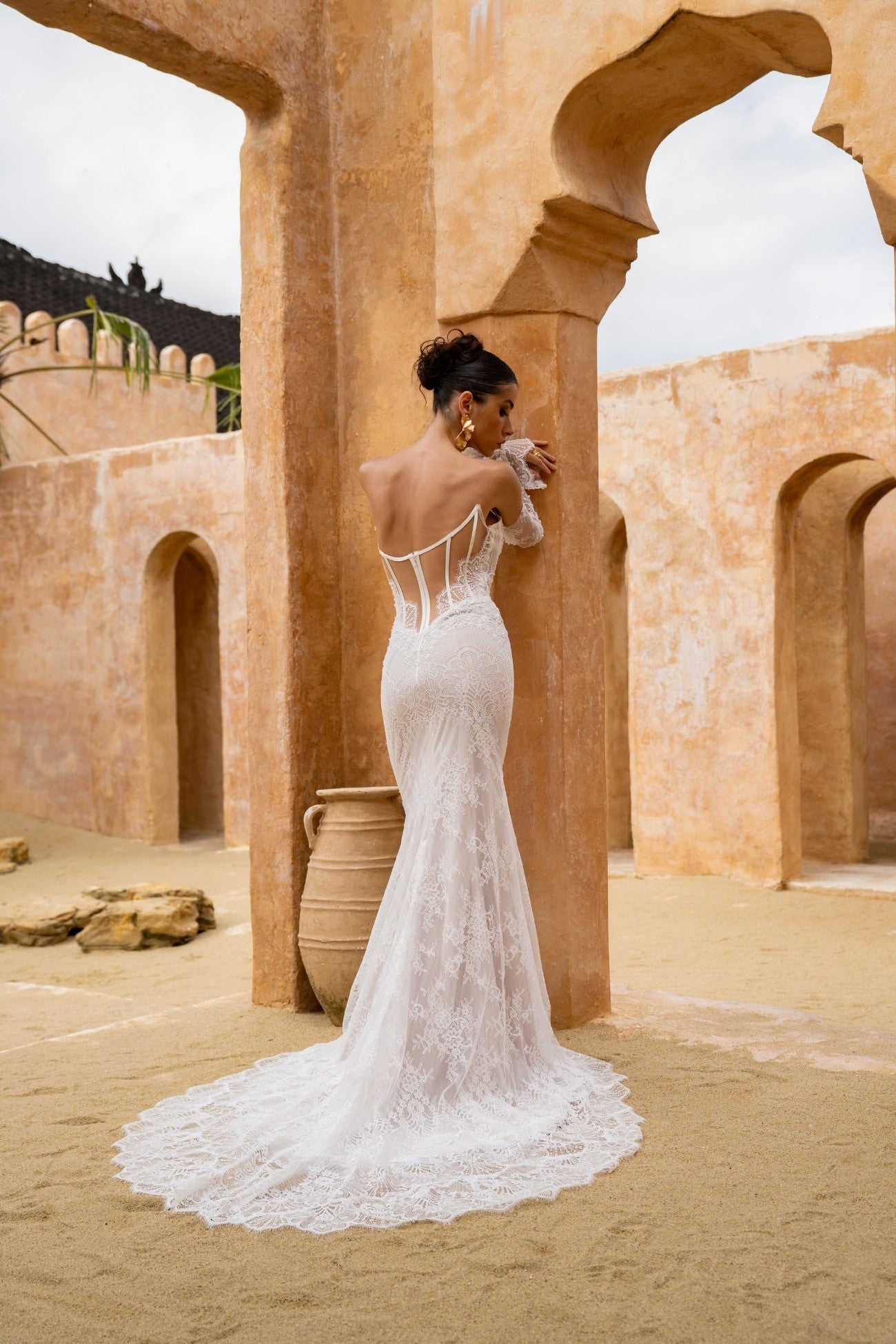 fitted lace wedding gown, with detachable fitted sleeves. 