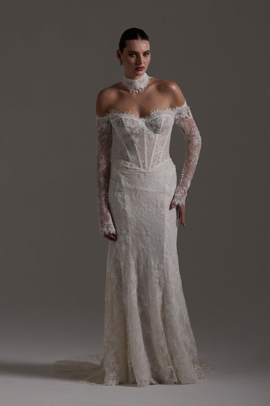 Fitted wedding gown featuring off-the-shoulder sleeves and neckline, vintage chantilly lace, basque waist, and lace choker. 