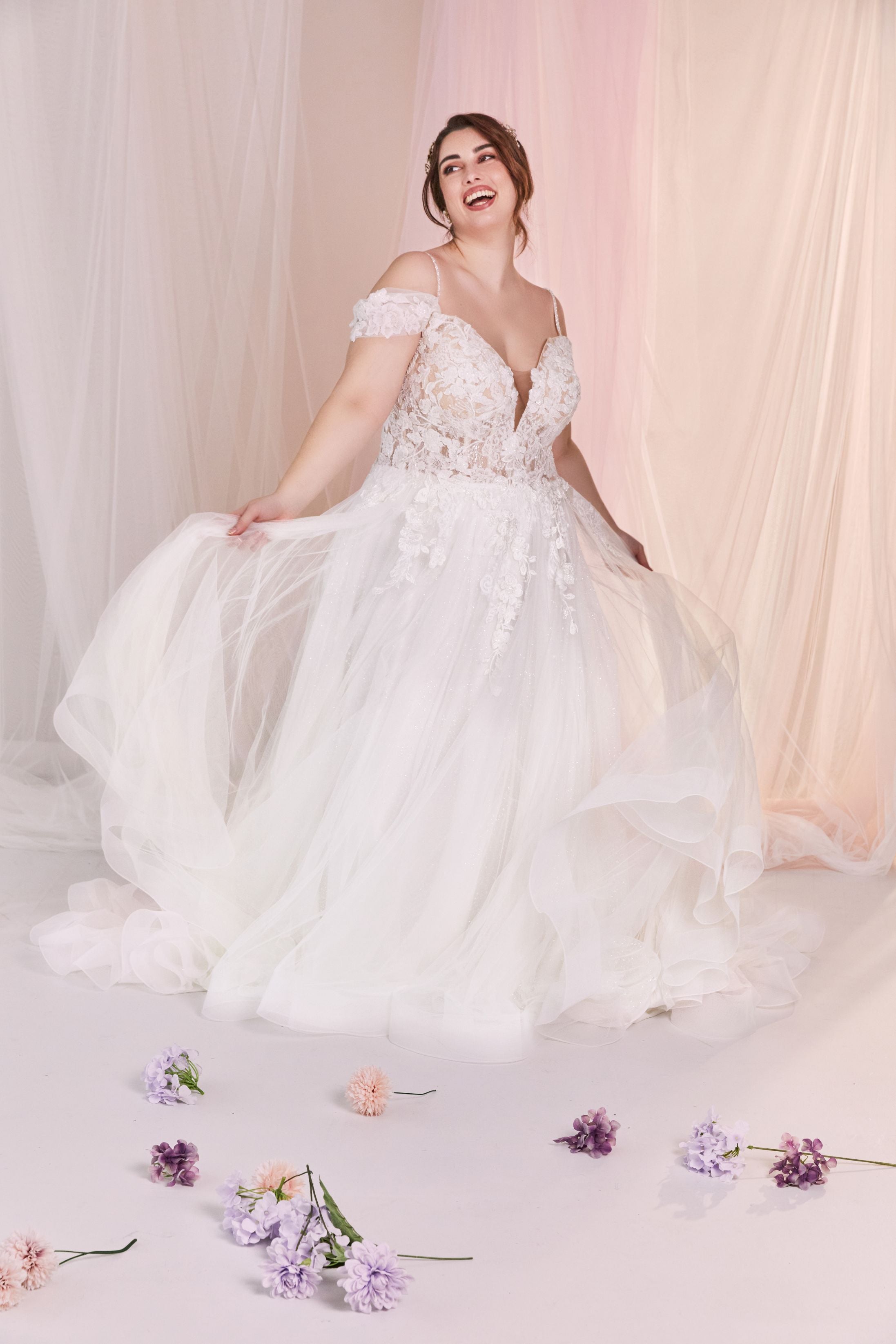 Lace and tulle A-line romantic wedding dress.