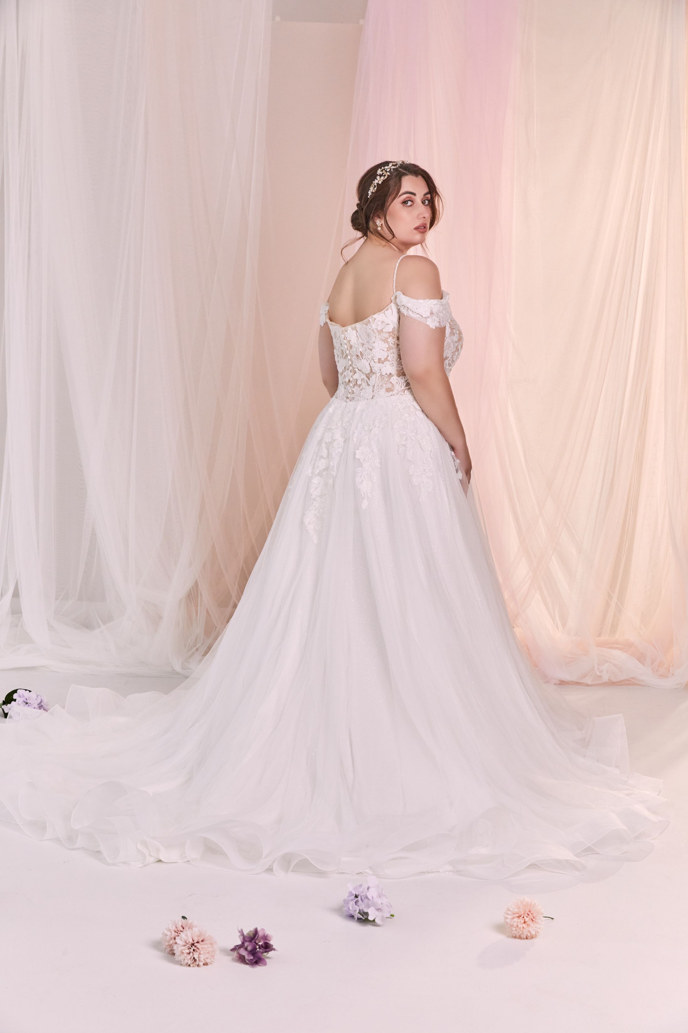 Lace and tulle A-line romantic wedding dress.