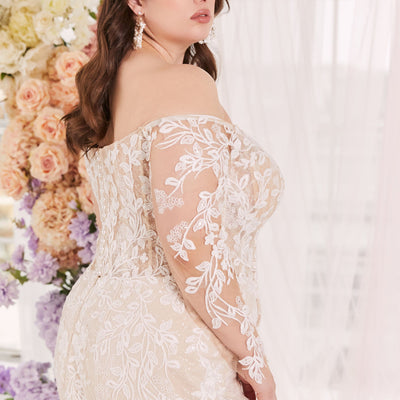 Lace long sleeve plunging neckline wedding dress.