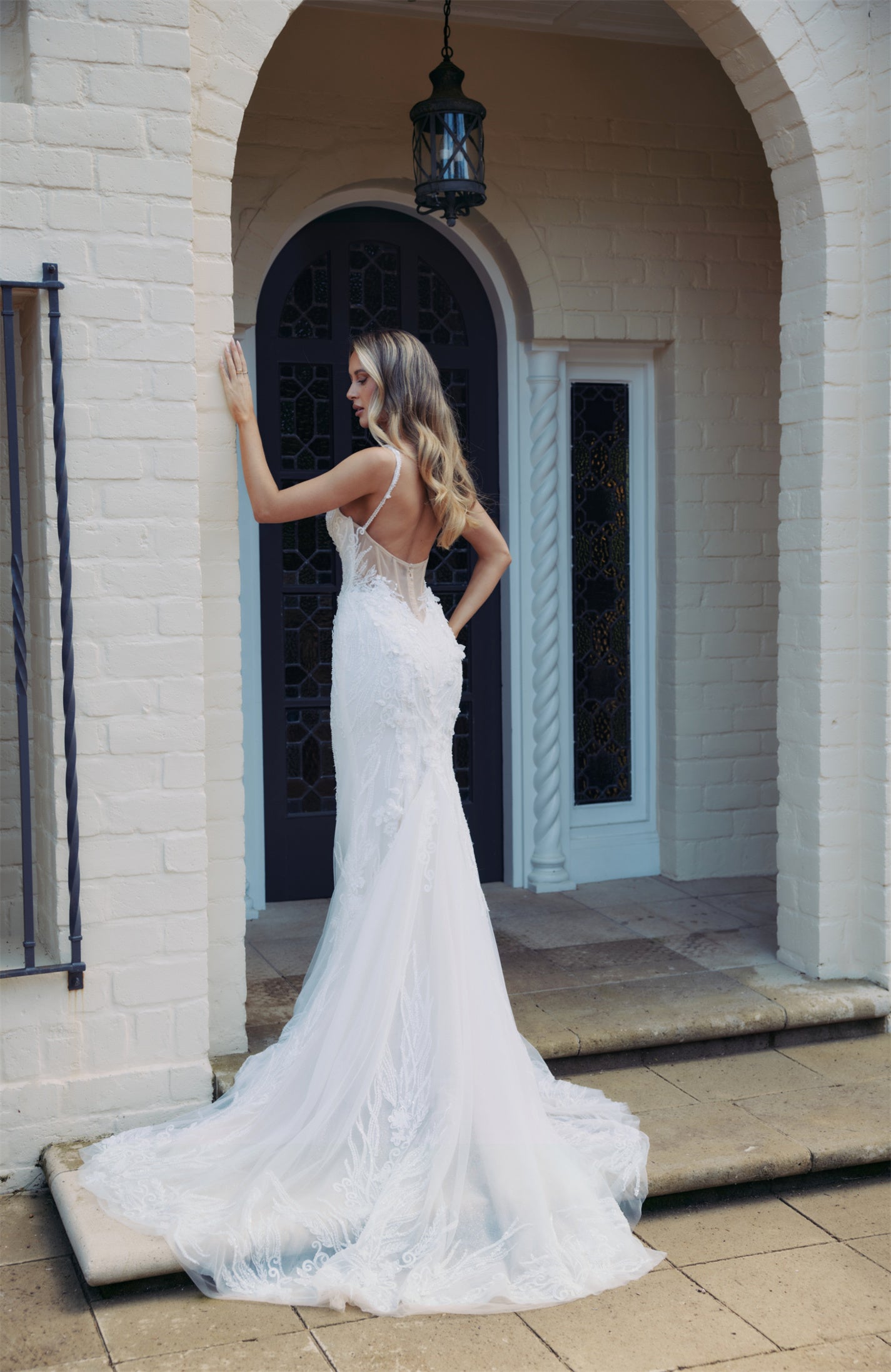 DAPHNE Bridal Gown - Wedding dress by Victoria Collection Jessica Couture. Featuring a Fit-N-Flare Beaded lace gown with chapel train, and V-plunge neckline 