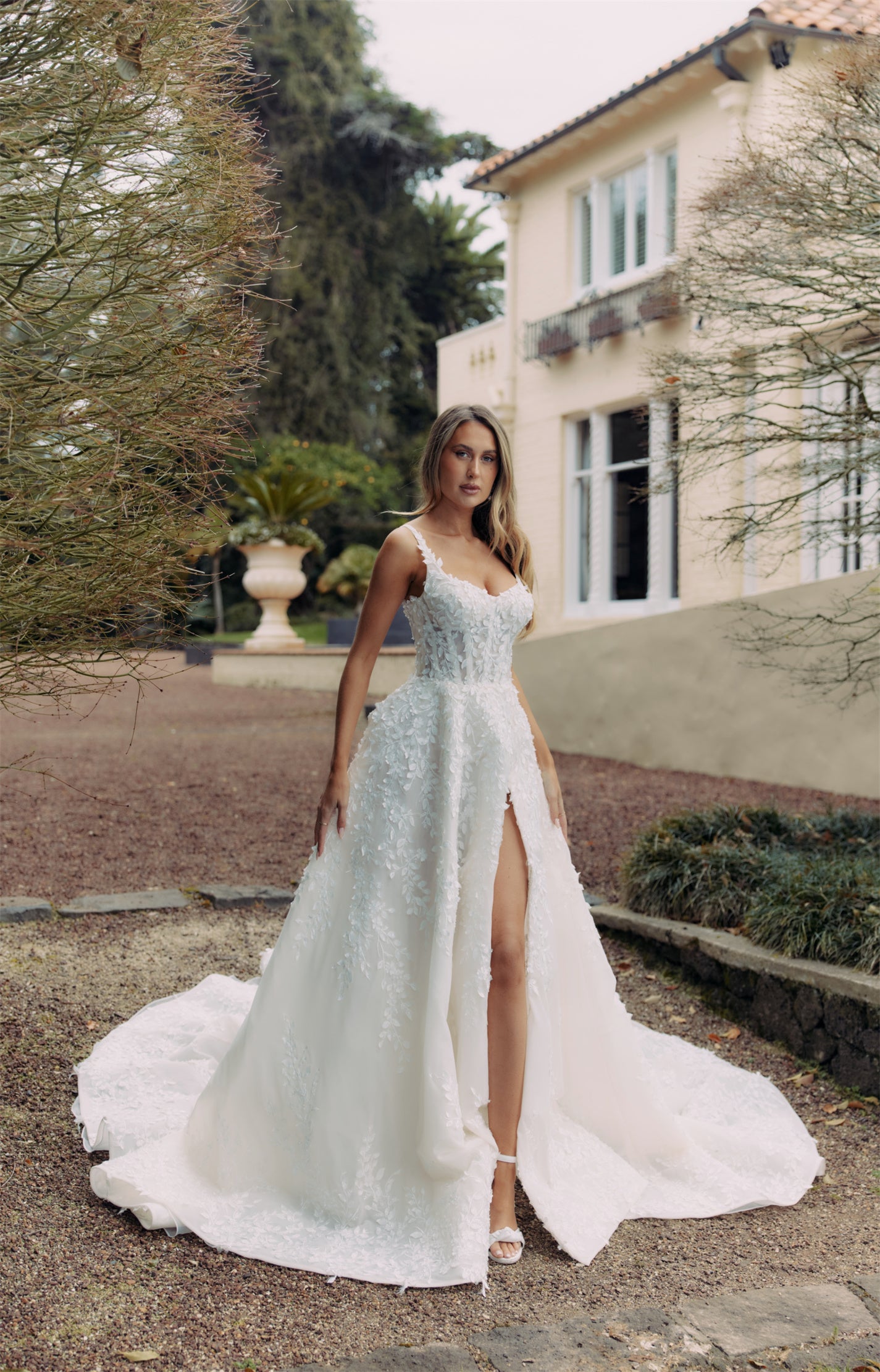 ELISE Bridal Gown - Wedding dress by Victoria Collection Jessica Couture. Featuring an A-line gown with chapel train, and floral lace. 