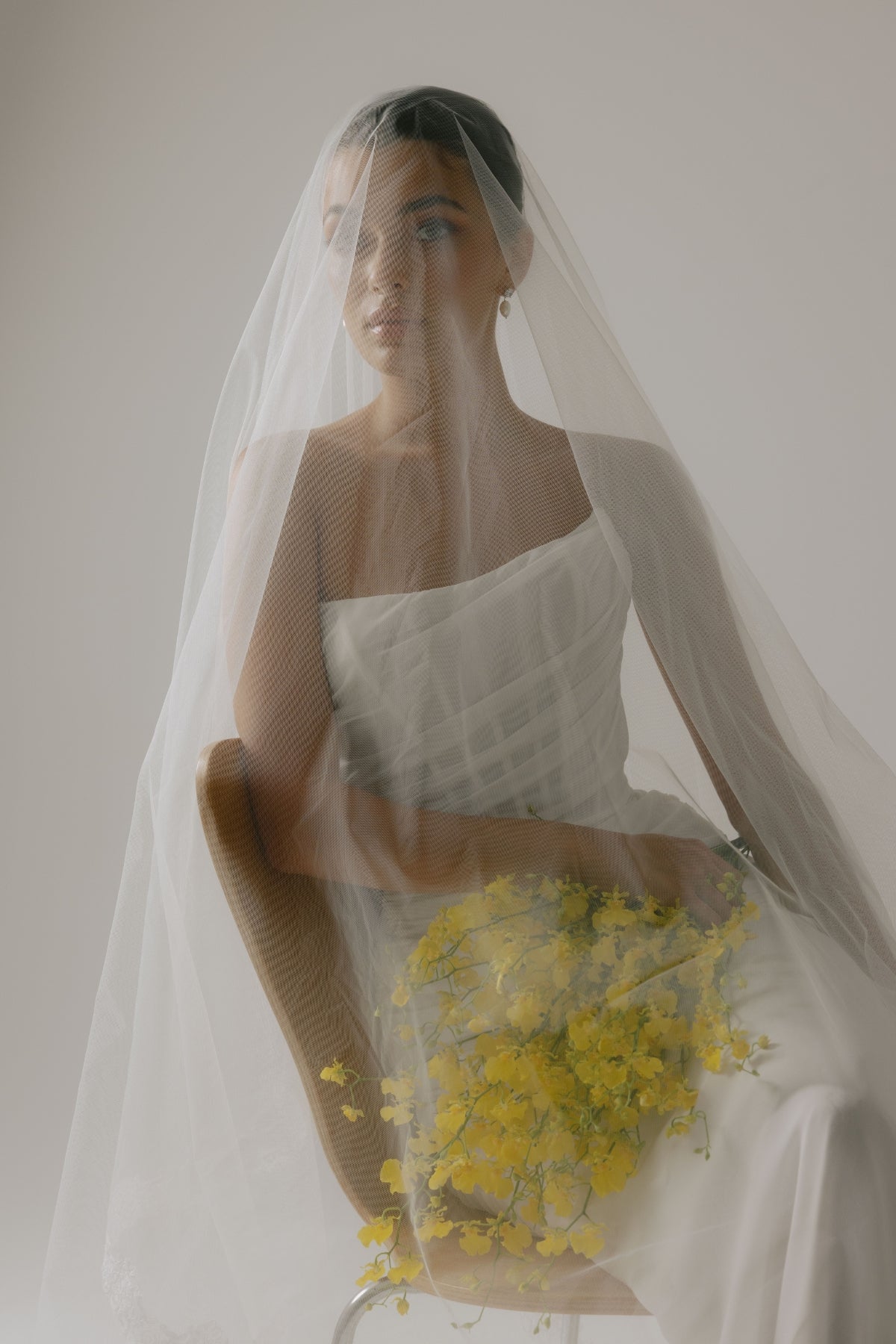 Corseted chiffon wedding gown, fitted lace-up back style. 