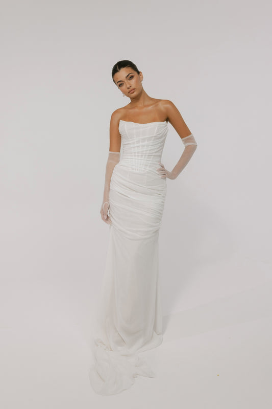 Corseted chiffon wedding gown, fitted lace-up back style. 