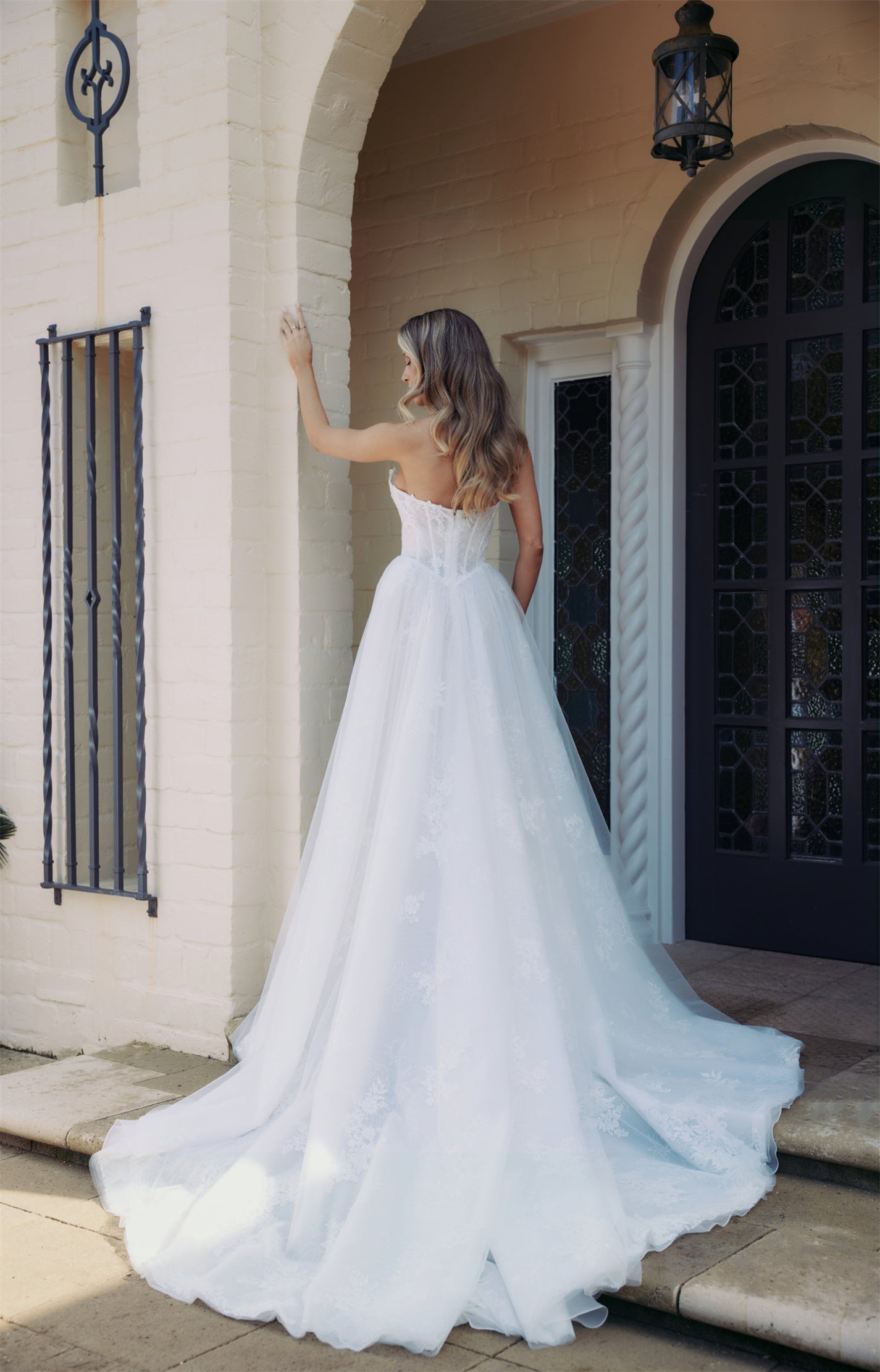 FAYE Bridal gown - By Victoria Collection Jessica Couture, featuring an A-line gown with Cat-eye bodice covered in delicate lace