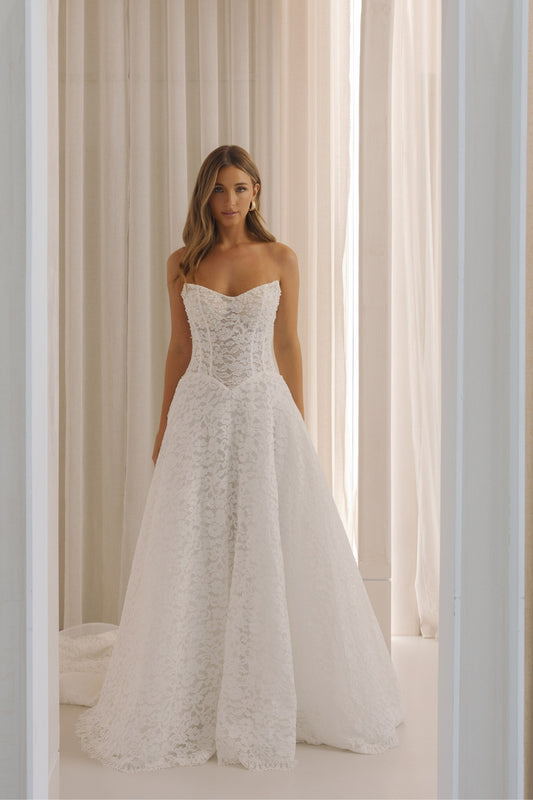 Lace A-line wedding gown with basque waist 