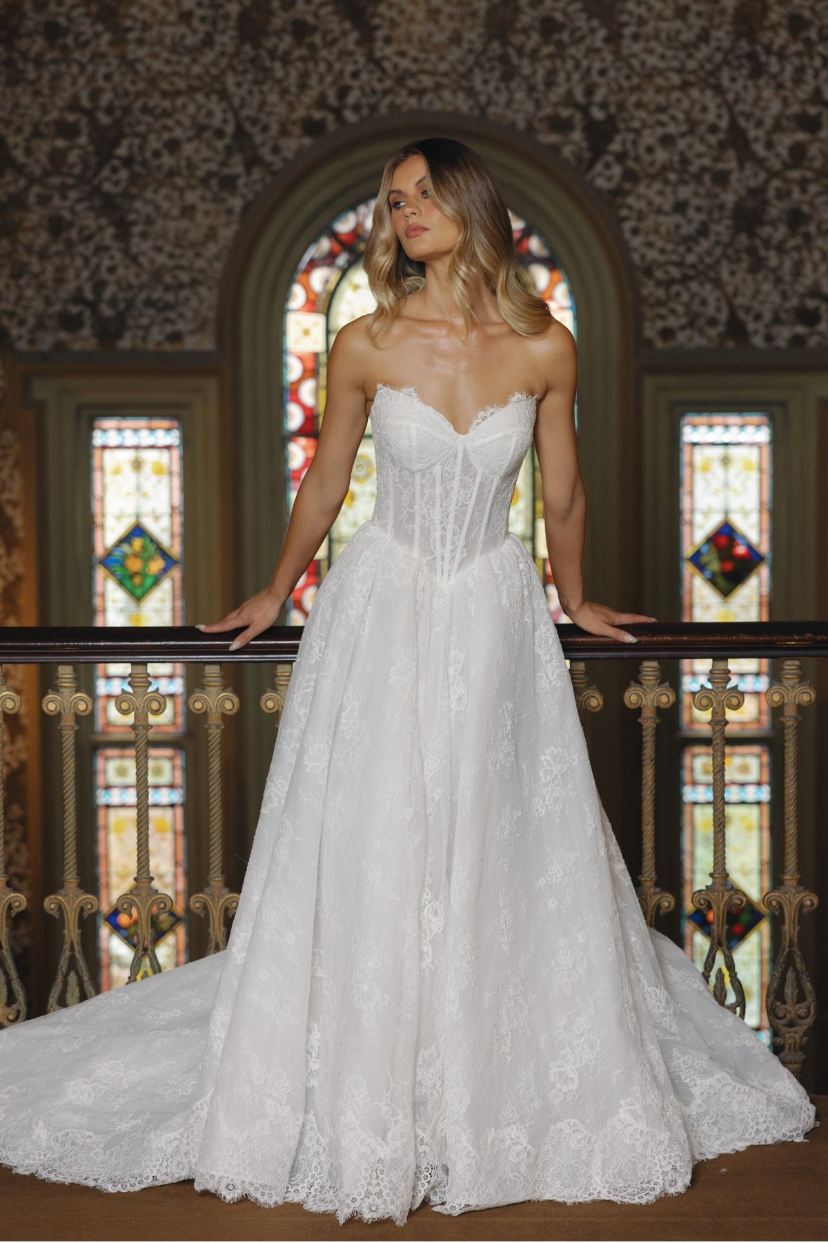 A-line wedding gown, sweetheart neckline and lace fabric. 