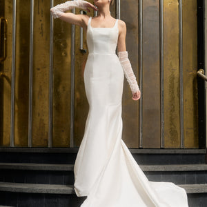 Ricci wedding dress with Ricci detachable sleeves made from gathered tulle and studded with pearl beads.