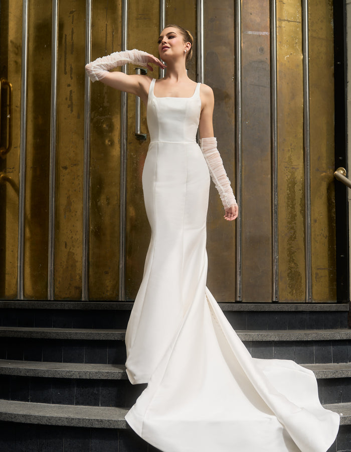 Ricci wedding dress with Ricci detachable sleeves made from gathered tulle and studded with pearl beads.