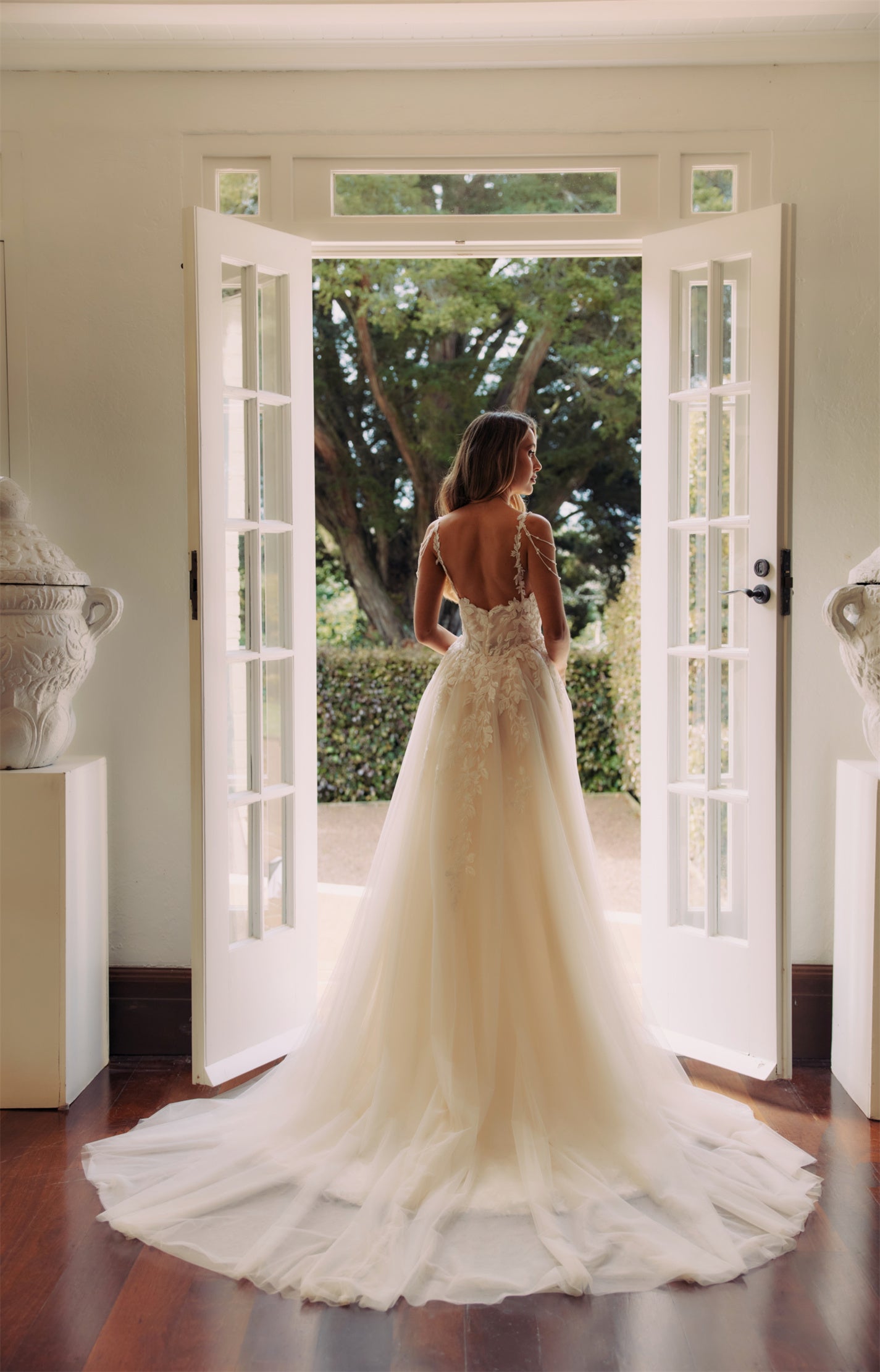 JOLIE Bridal Gown - Wedding dress by Victoria Collection Jessica Couture. Featuring an Fit-N-Flare floral lace gown with chapel train, and delicate pearl chains. 