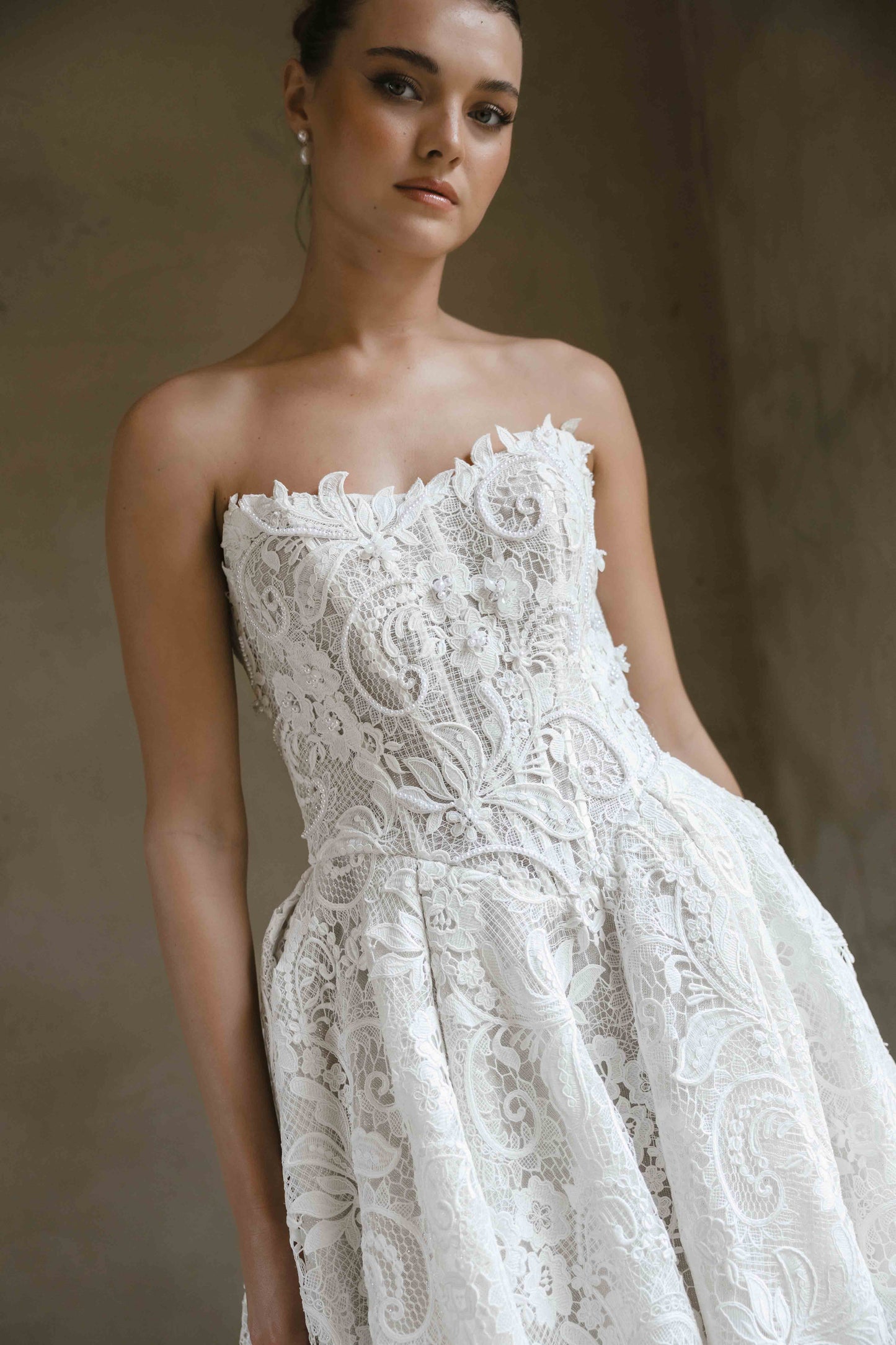 Vogue Gown – Full lace A-line ballgown with a cat-eye corseted bodice and subtle boning. By Roselle Collection, Jessica Couture.