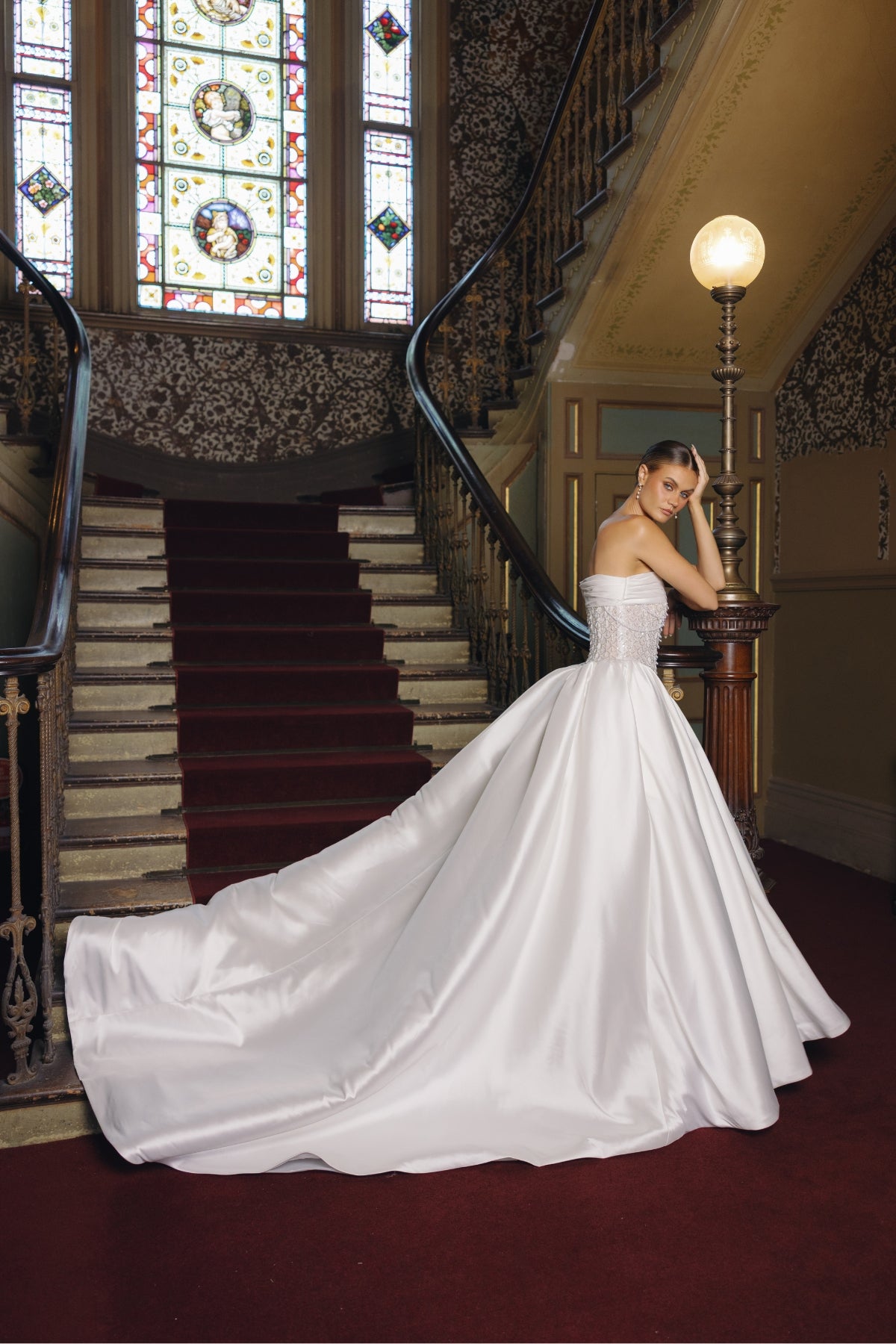 strapless A-line wedding gown with beaded pearl and crystal bodice, mikado fabric. 