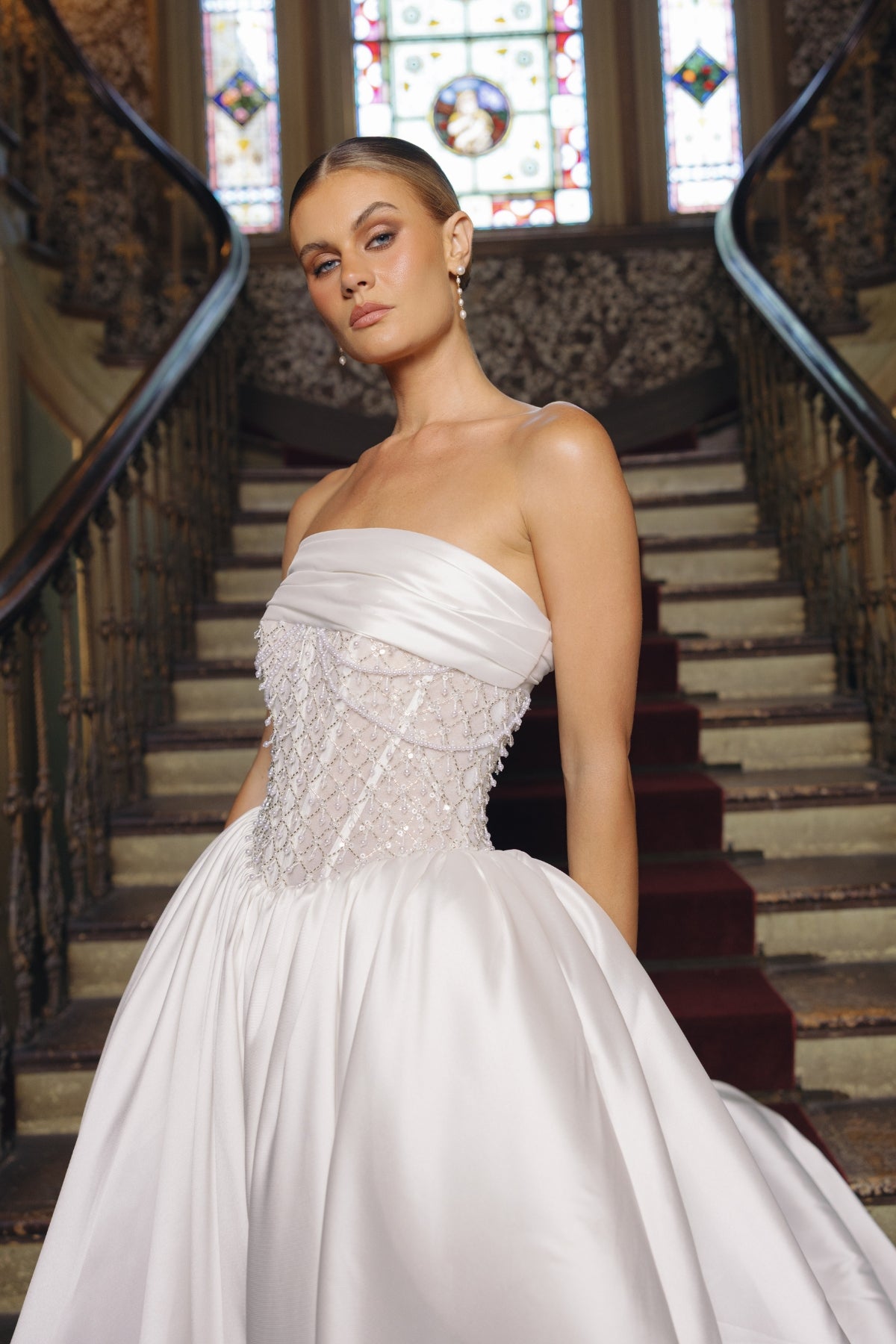 strapless A-line wedding gown with beaded pearl and crystal bodice, mikado fabric. 