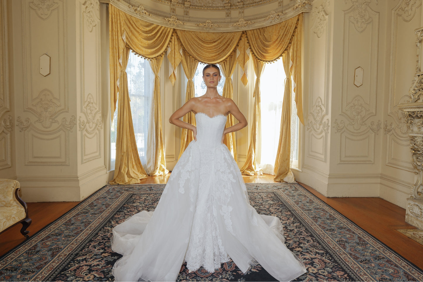 fitted lace wedding gown with sweetheart neckline and scalloped train 