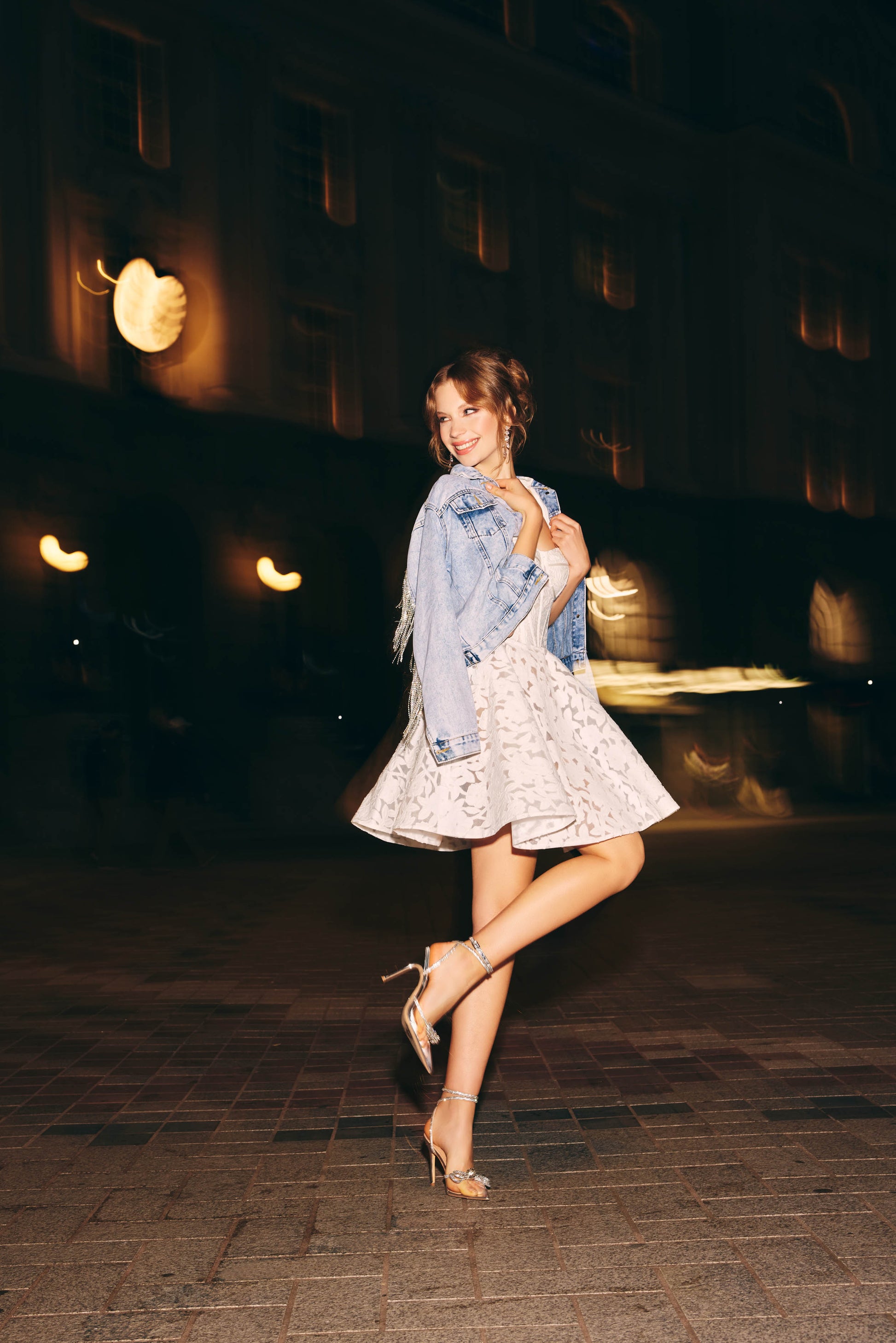 A-line mini Bridal dress with laser cut floral lace detailing featuring a
square neckline with ribbon straps 