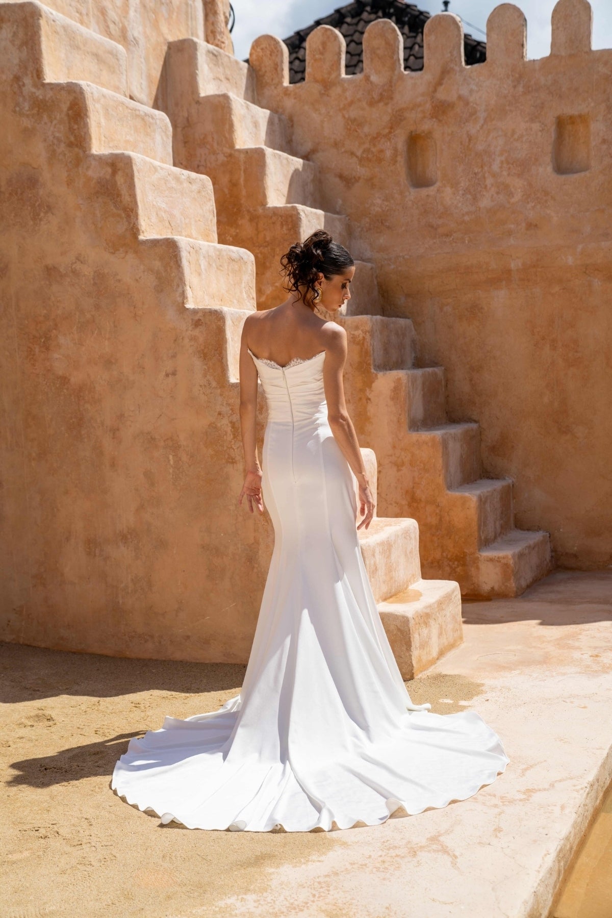 Fitted wedding dress, in plain crepe with lace covering the split. sweetheart neckline, complete with detachable fitted lace sleeves 