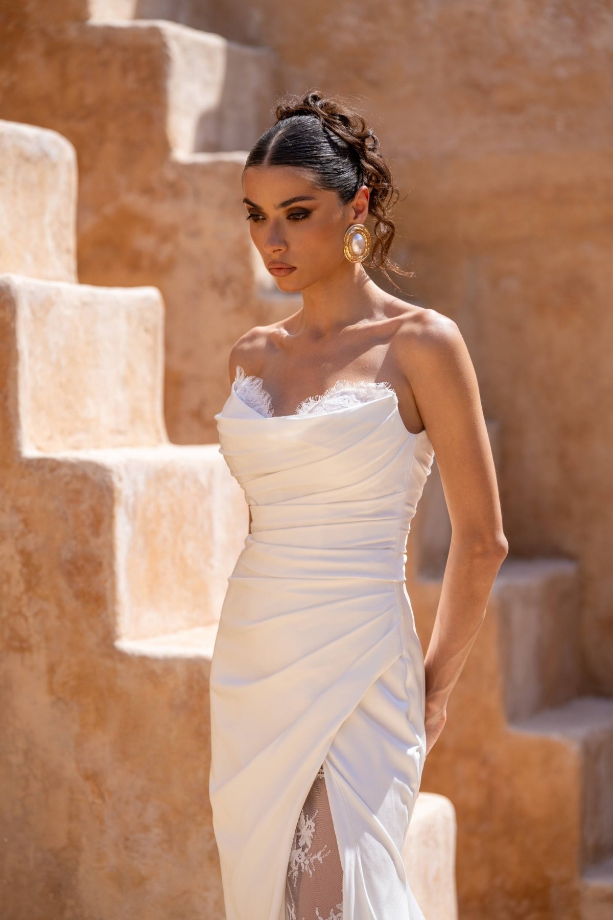 Fitted wedding dress, in plain crepe with lace covering the split. sweetheart neckline, complete with detachable fitted lace sleeves 