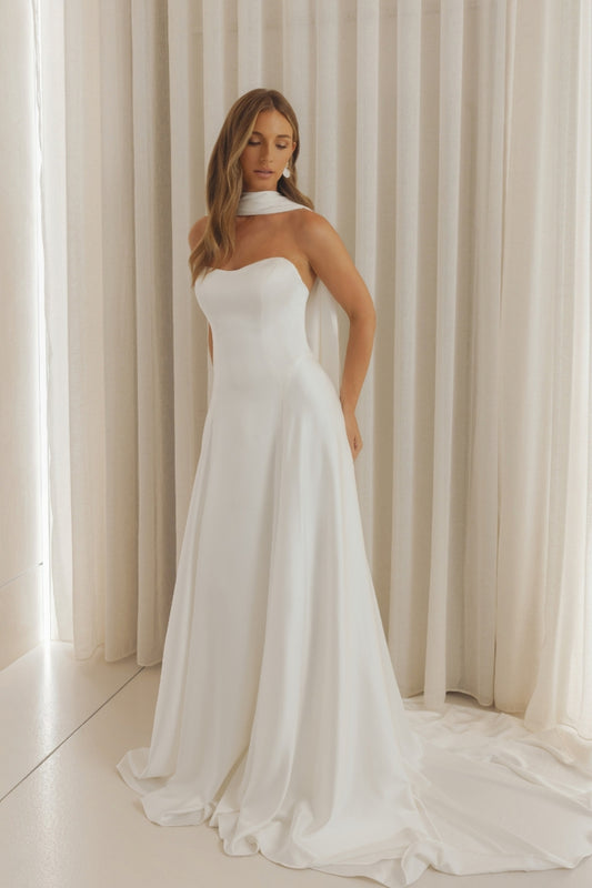 Satin wedding gown with sweetheart neckline, slim A-line sheath fit. 